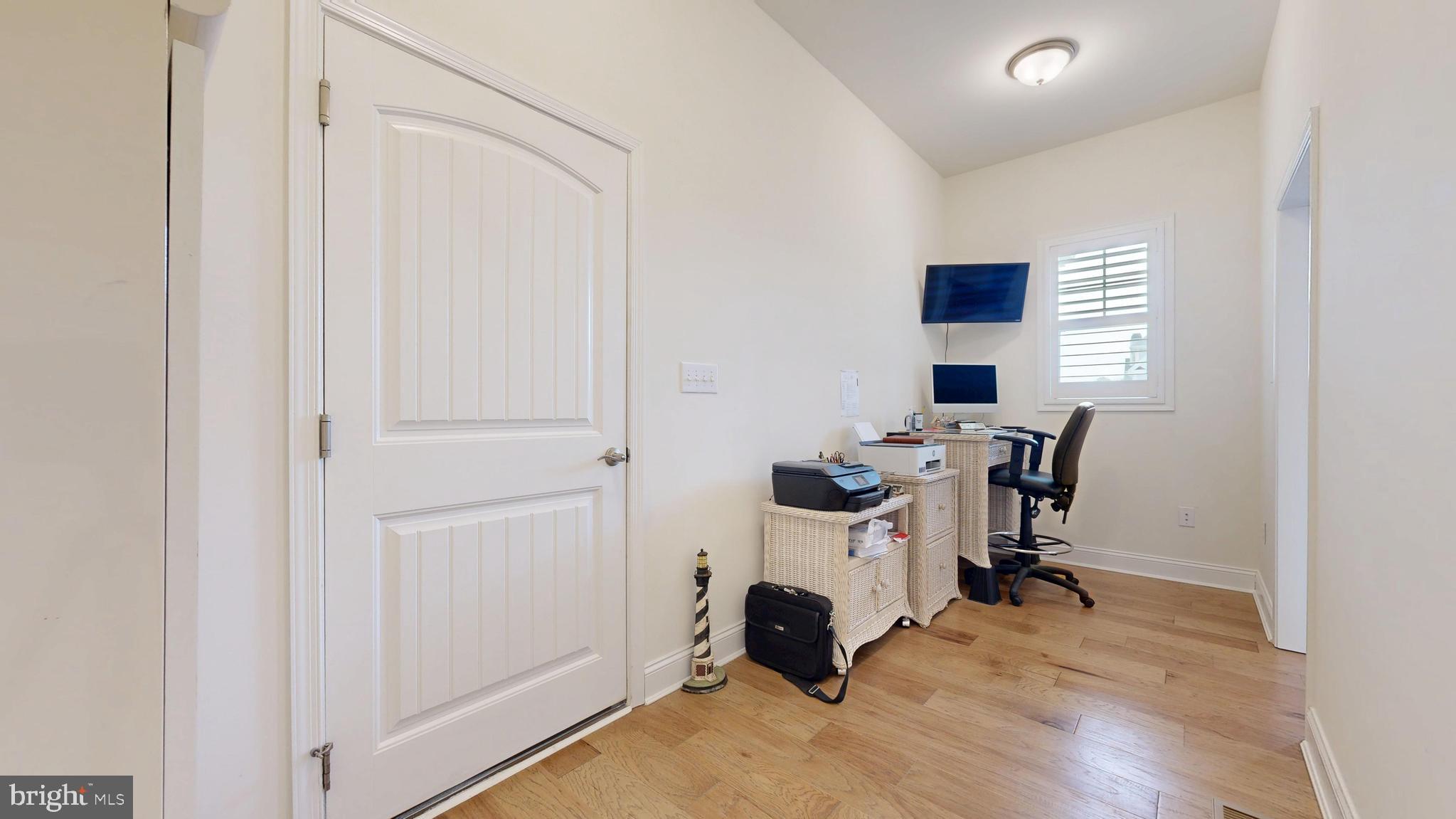 33528 Downing Circle Lewes, DE 19958 - Photo 52 of 72 a view of a workspace with furniture and a window