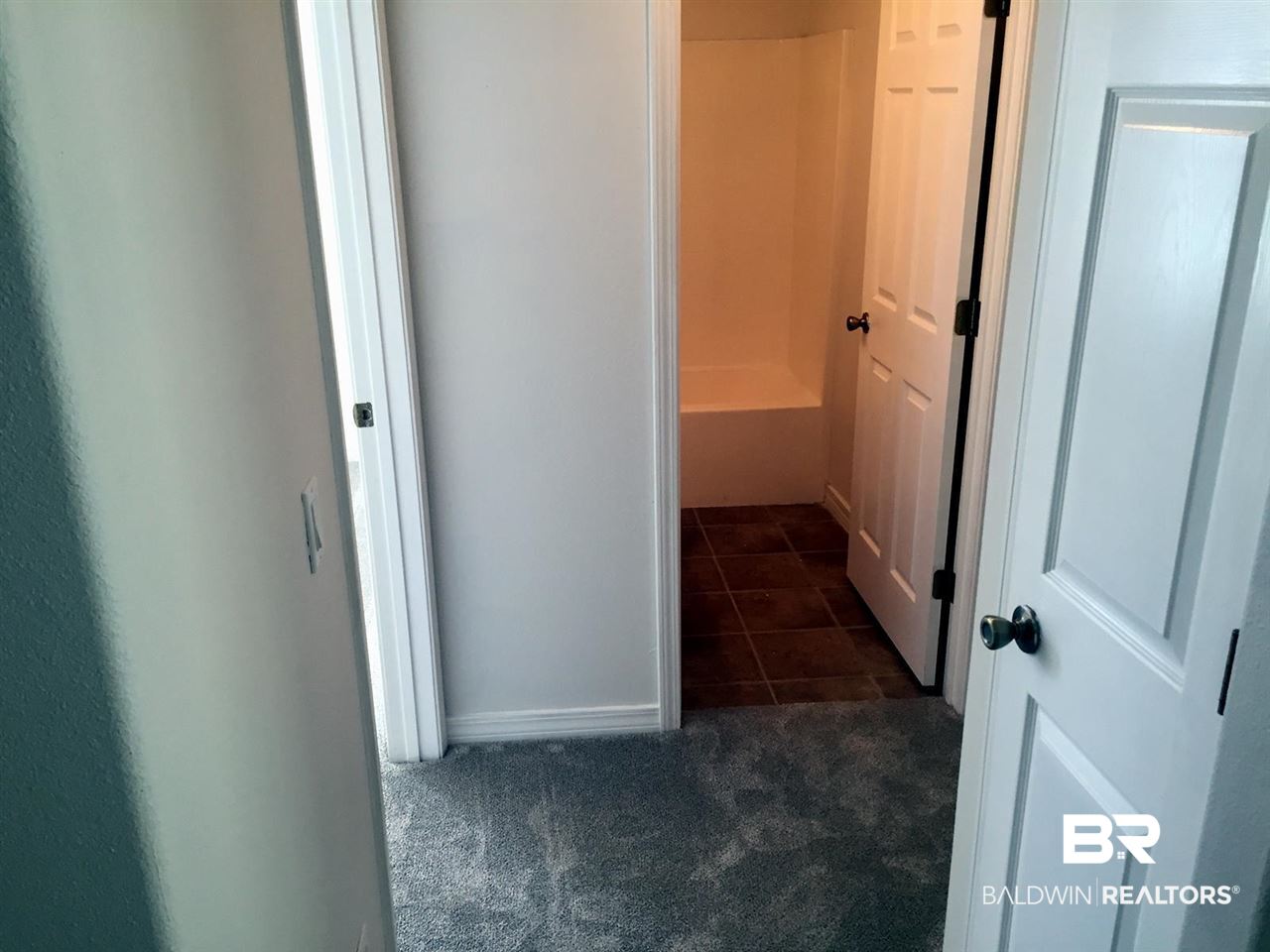 1900 South Bay Street Foley, AL 36535 - Photo 29 of 40 hall leading to bedrooms