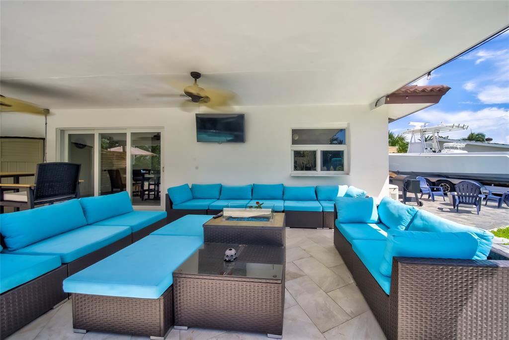 250 Northeast 27th Court Boca Raton, FL 33431 - Photo 15 of 29 a living room with furniture and a window