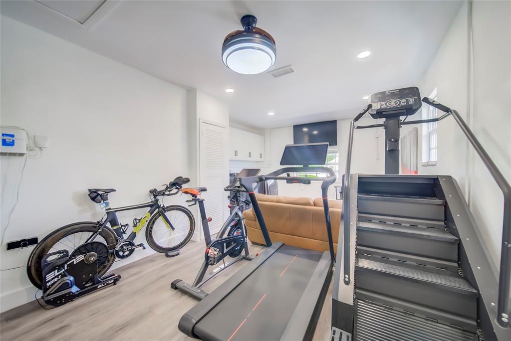 250 Northeast 27th Court Boca Raton, FL 33431 - Photo 18 of 29 a view of a room with gym equipment