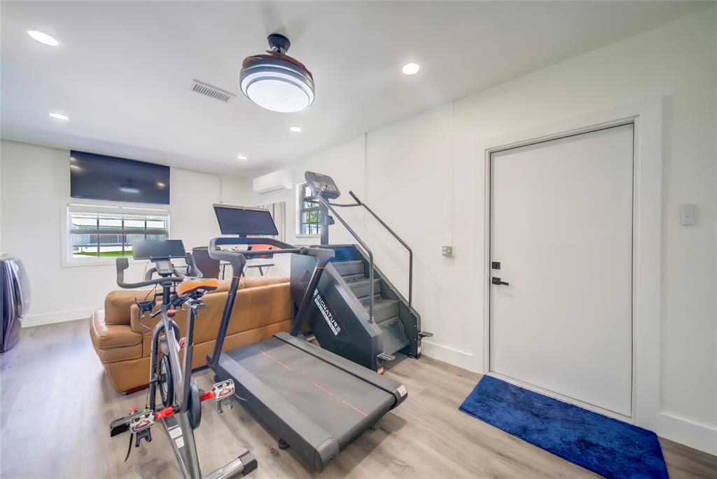 250 Northeast 27th Court Boca Raton, FL 33431 - Photo 19 of 29 a view of a room with gym equipment