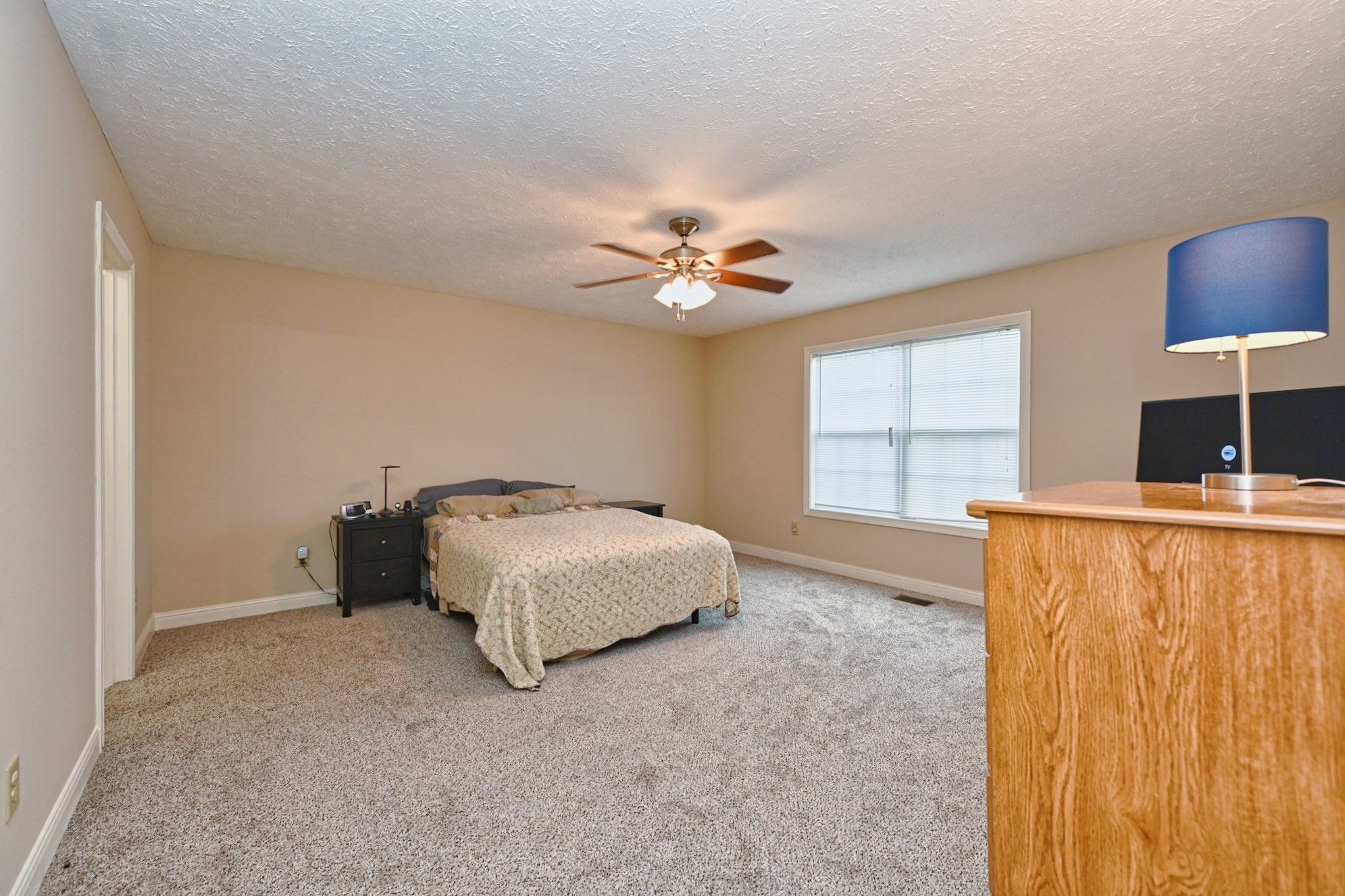 134 T G T Road Portland, TN 37148 - Photo 14 of 27 a bedroom with a bed and a window