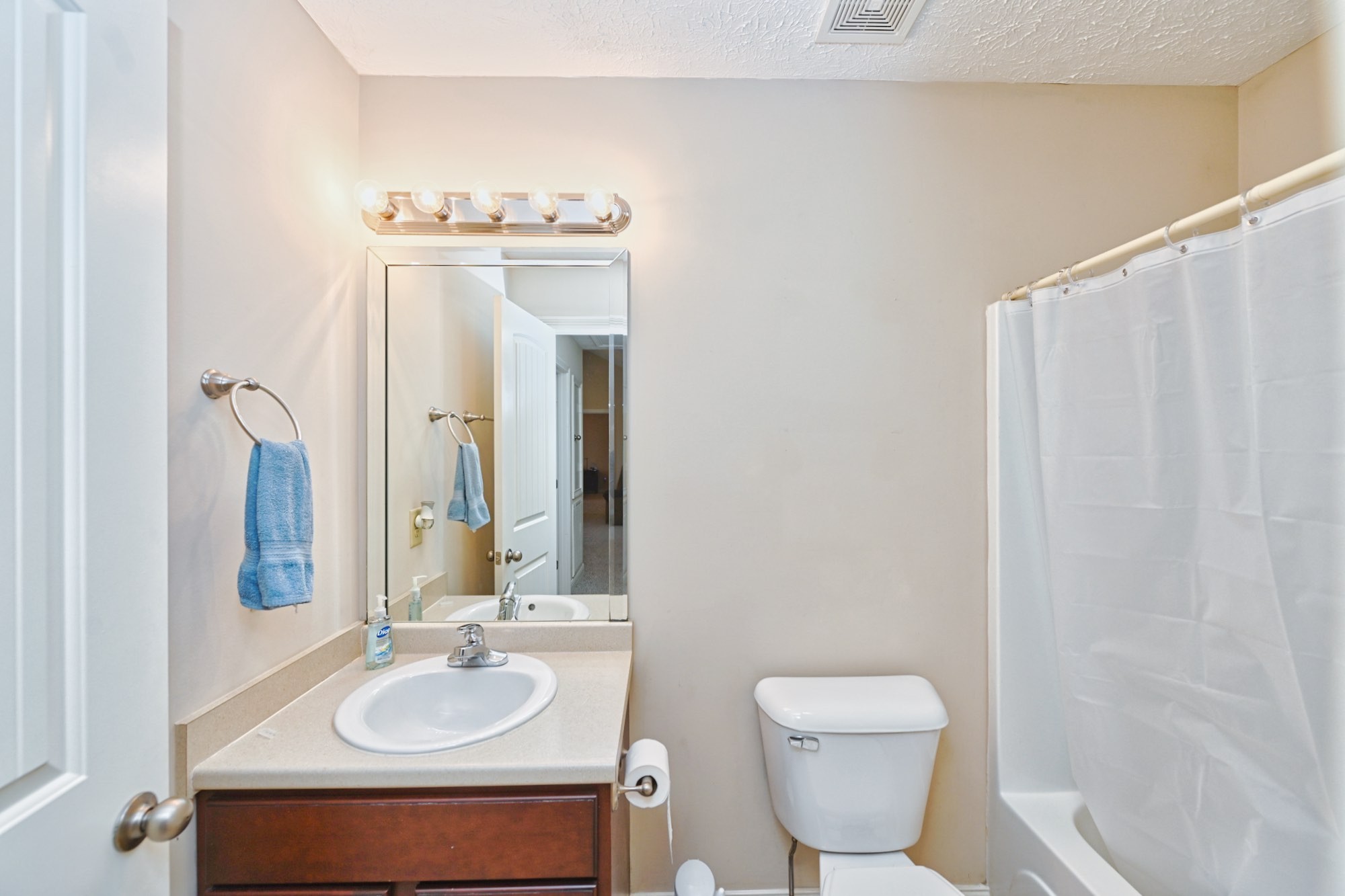 134 T G T Road Portland, TN 37148 - Photo 23 of 27 a bathroom with a sink toilet and a mirror