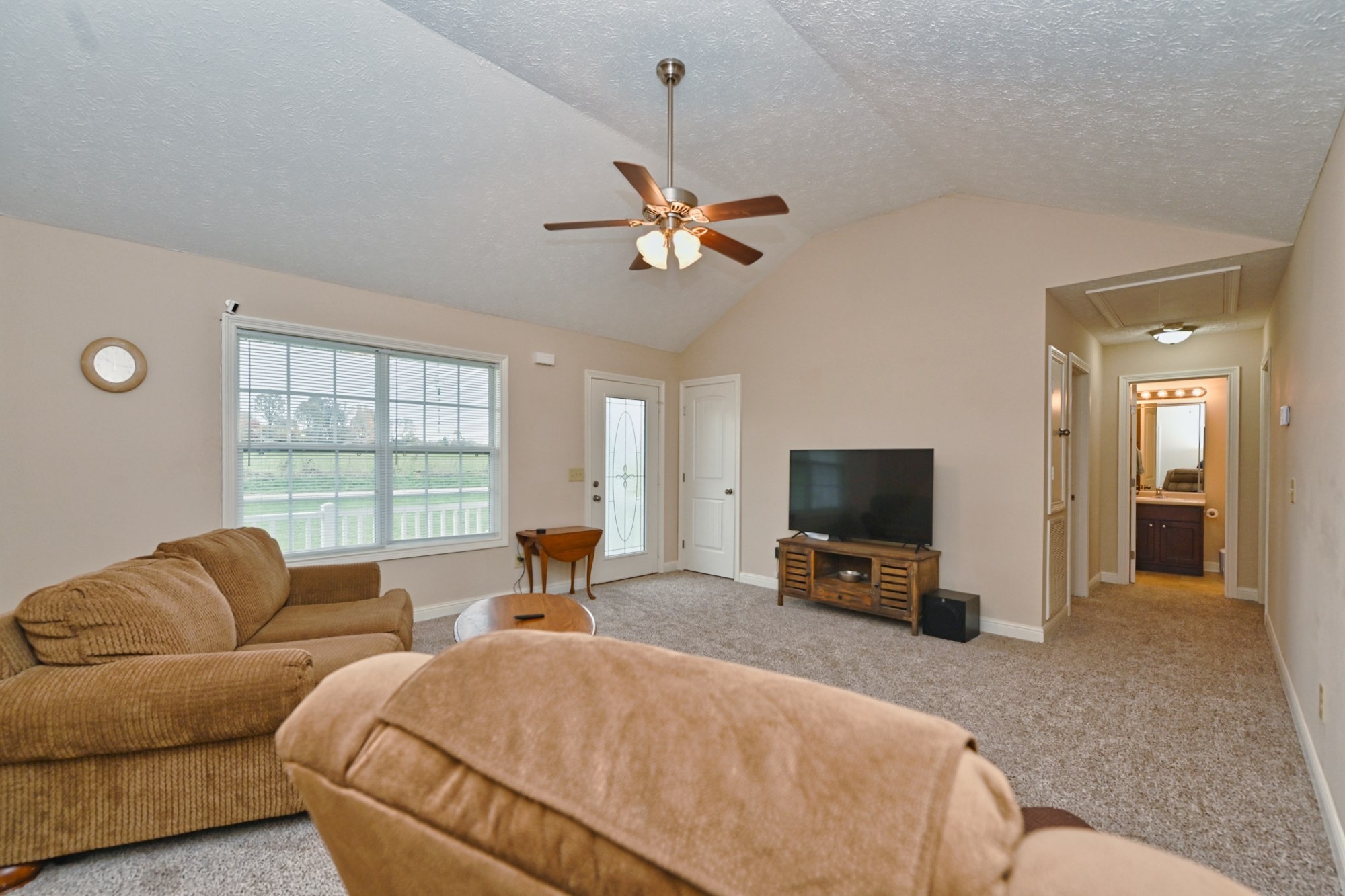 134 T G T Road Portland, TN 37148 - Photo 6 of 27 a living room with furniture tv and a window