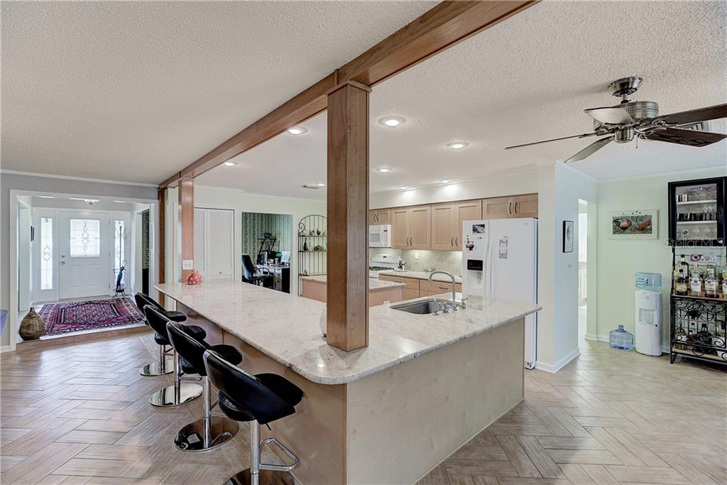 4873 Old Ranch Road Sarasota, FL 34241 - Photo 8 of 49 Looking towards the front door from the kitchen/family room