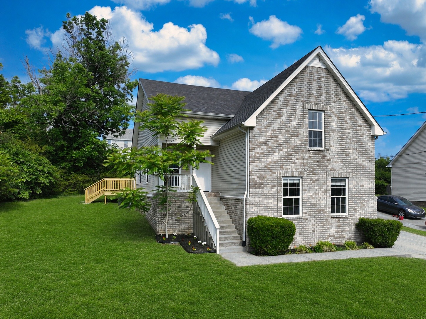200 Larkin Springs Road Madison, TN 37115 - Photo 1 of 89 a front view of a house with a yard