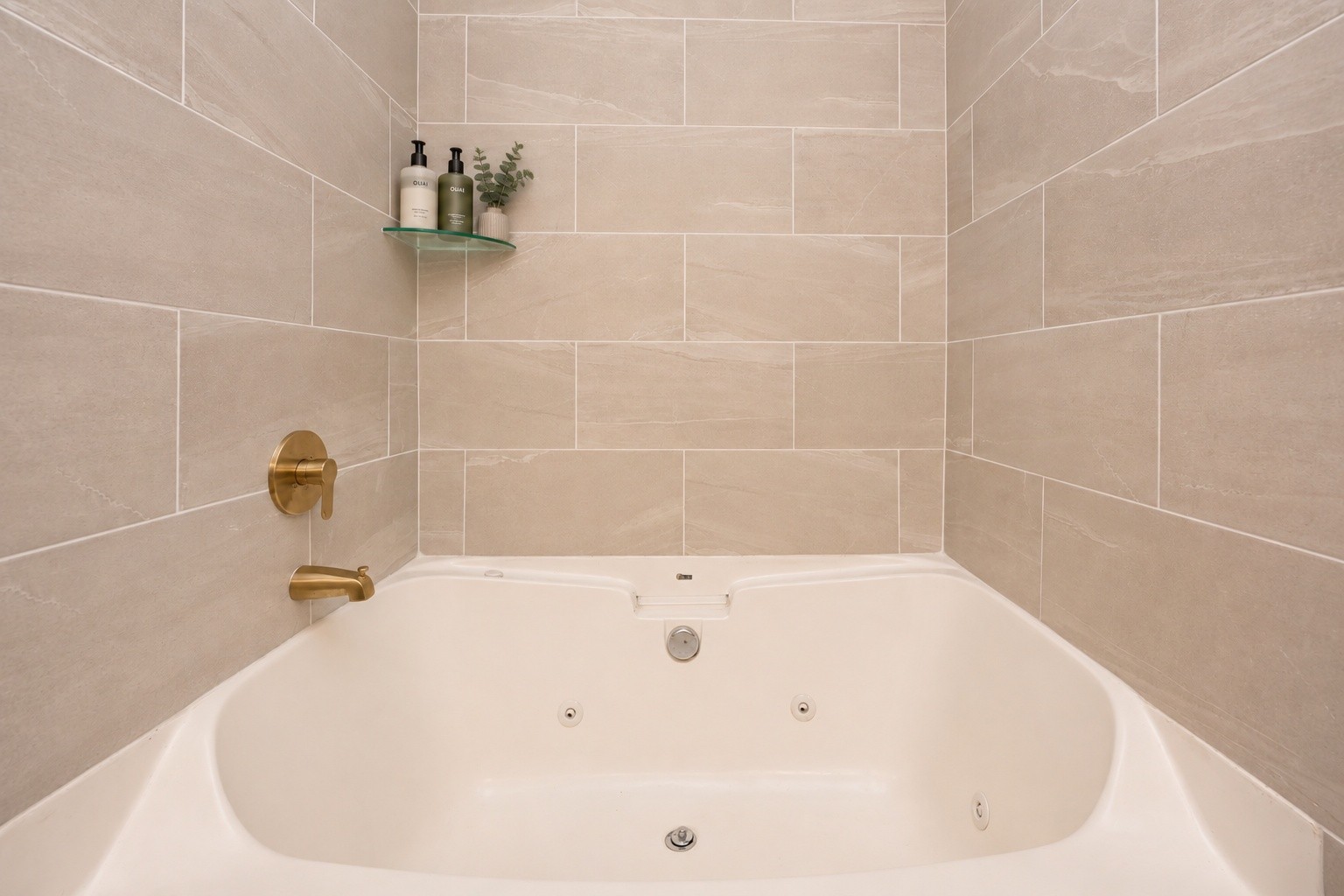 200 Larkin Springs Road Madison, TN 37115 - Photo 12 of 89 a white bath tub sitting in a bathroom