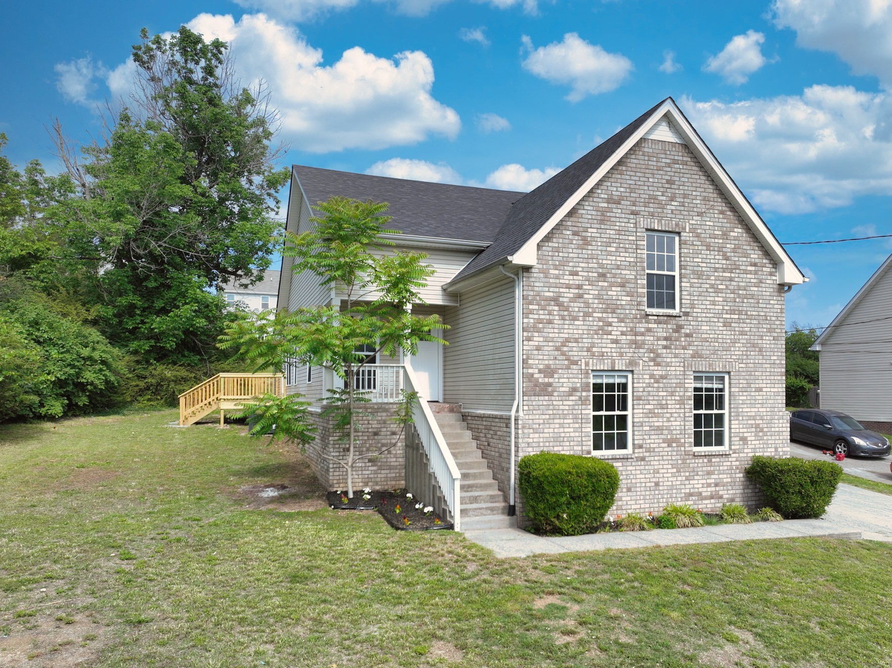 200 Larkin Springs Road Madison, TN 37115 - Photo 20 of 89 a front view of a house with a yard