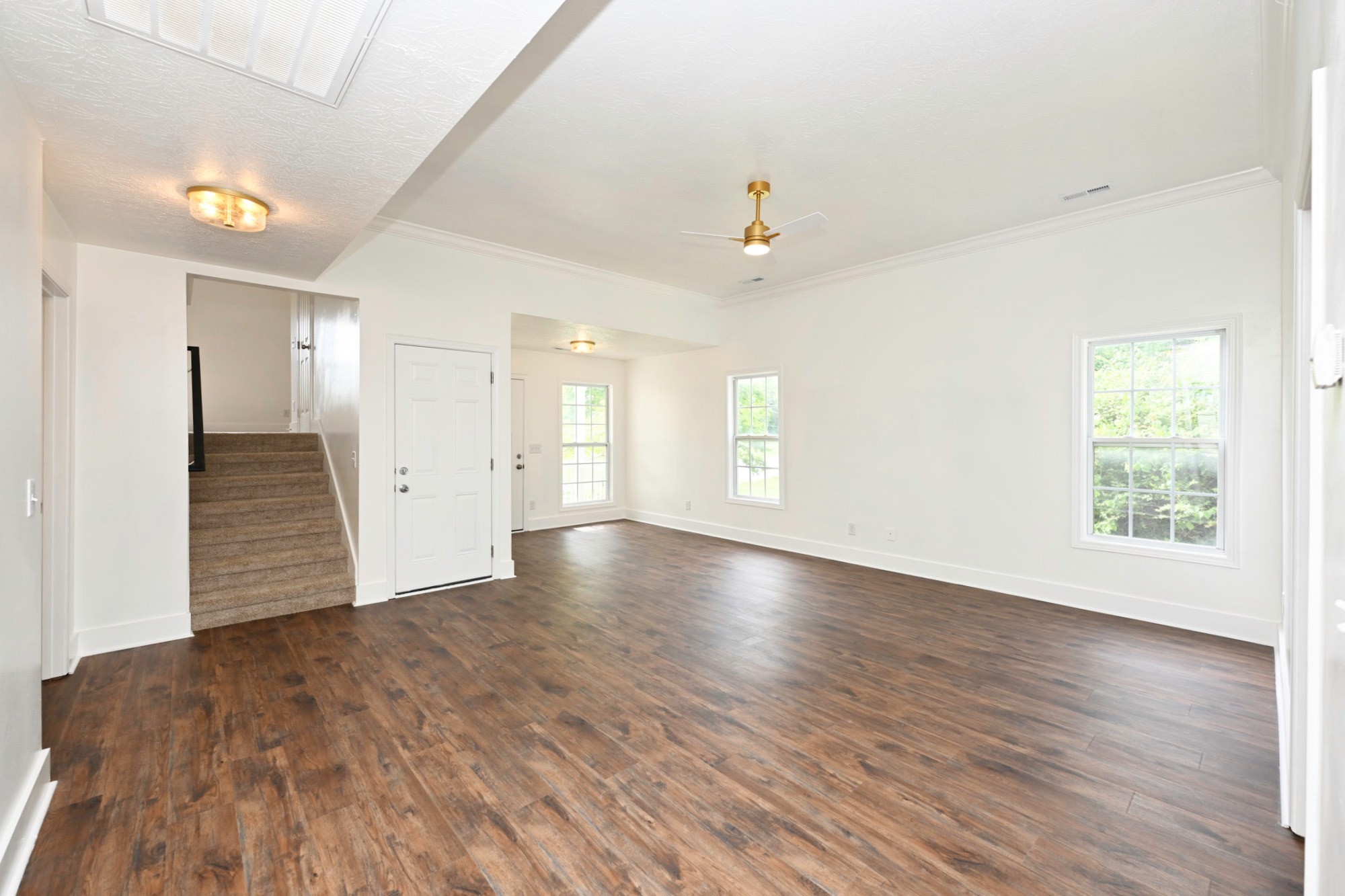 200 Larkin Springs Road Madison, TN 37115 - Photo 46 of 89 a view of an empty room with window and wooden floor