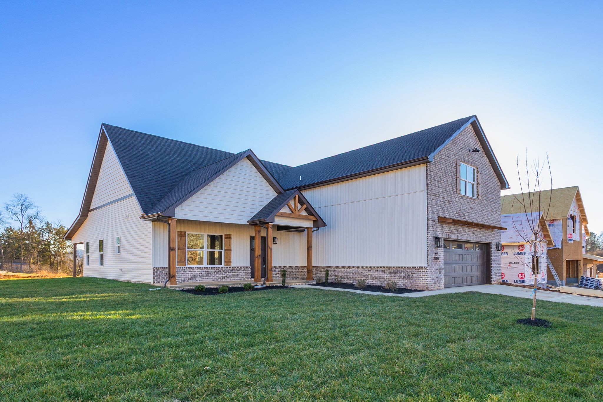 2504 Gentle Rain Road Knoxville, TN 37920 - Photo 2 of 45 a house that is sitting in the grass