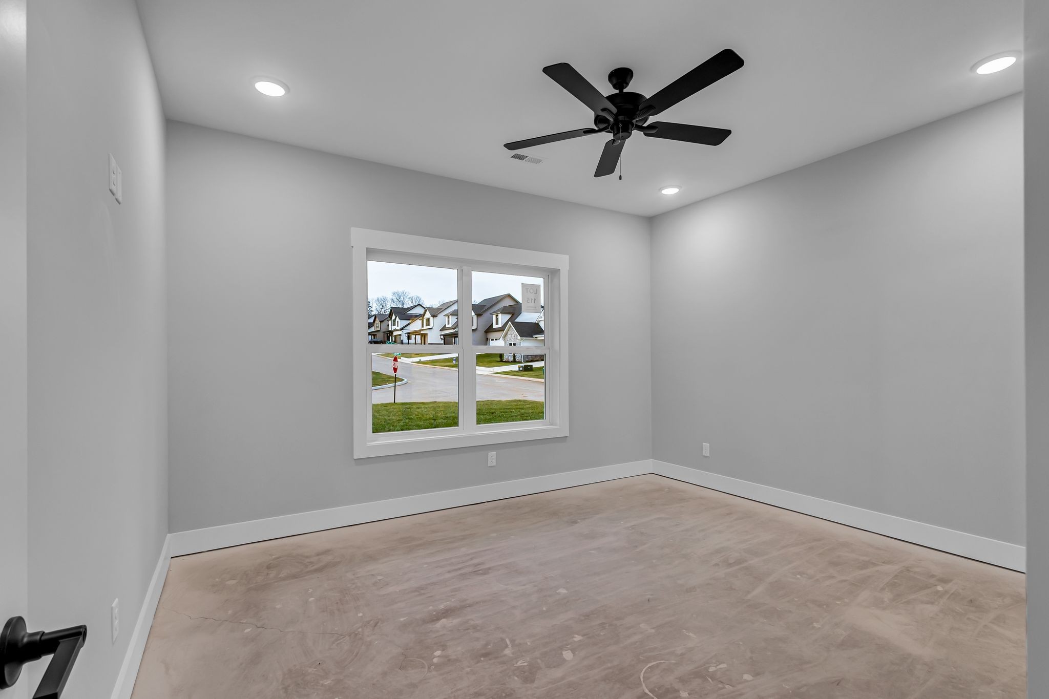 2504 Gentle Rain Road Knoxville, TN 37920 - Photo 21 of 45 an empty room with window and ceiling fan
