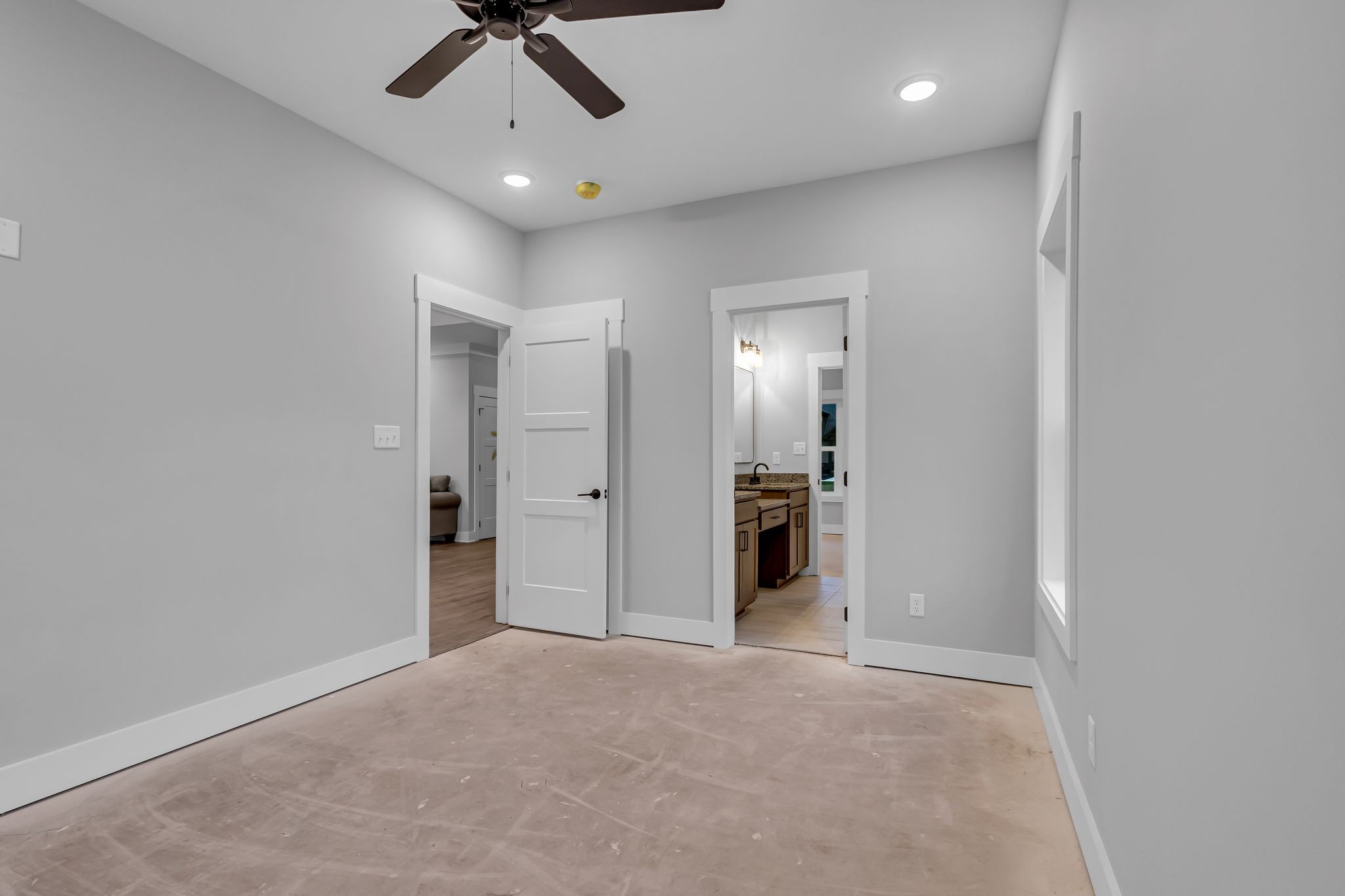 2504 Gentle Rain Road Knoxville, TN 37920 - Photo 25 of 45 en empty room with a ceiling fan and carpet