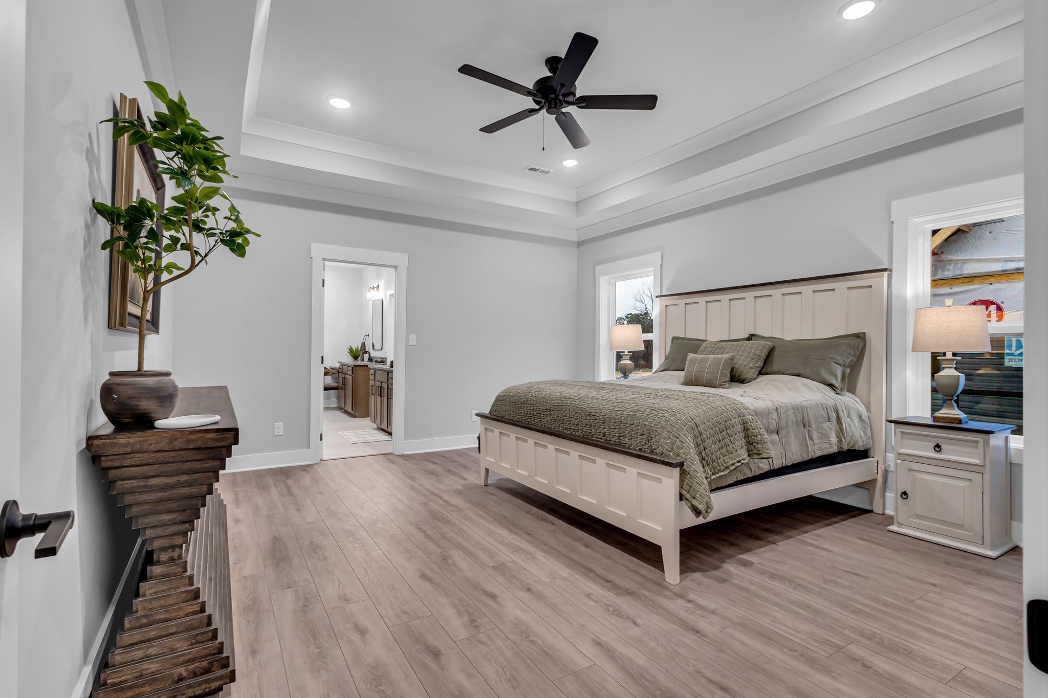 2504 Gentle Rain Road Knoxville, TN 37920 - Photo 28 of 45 a bedroom with a bed and a potted plant