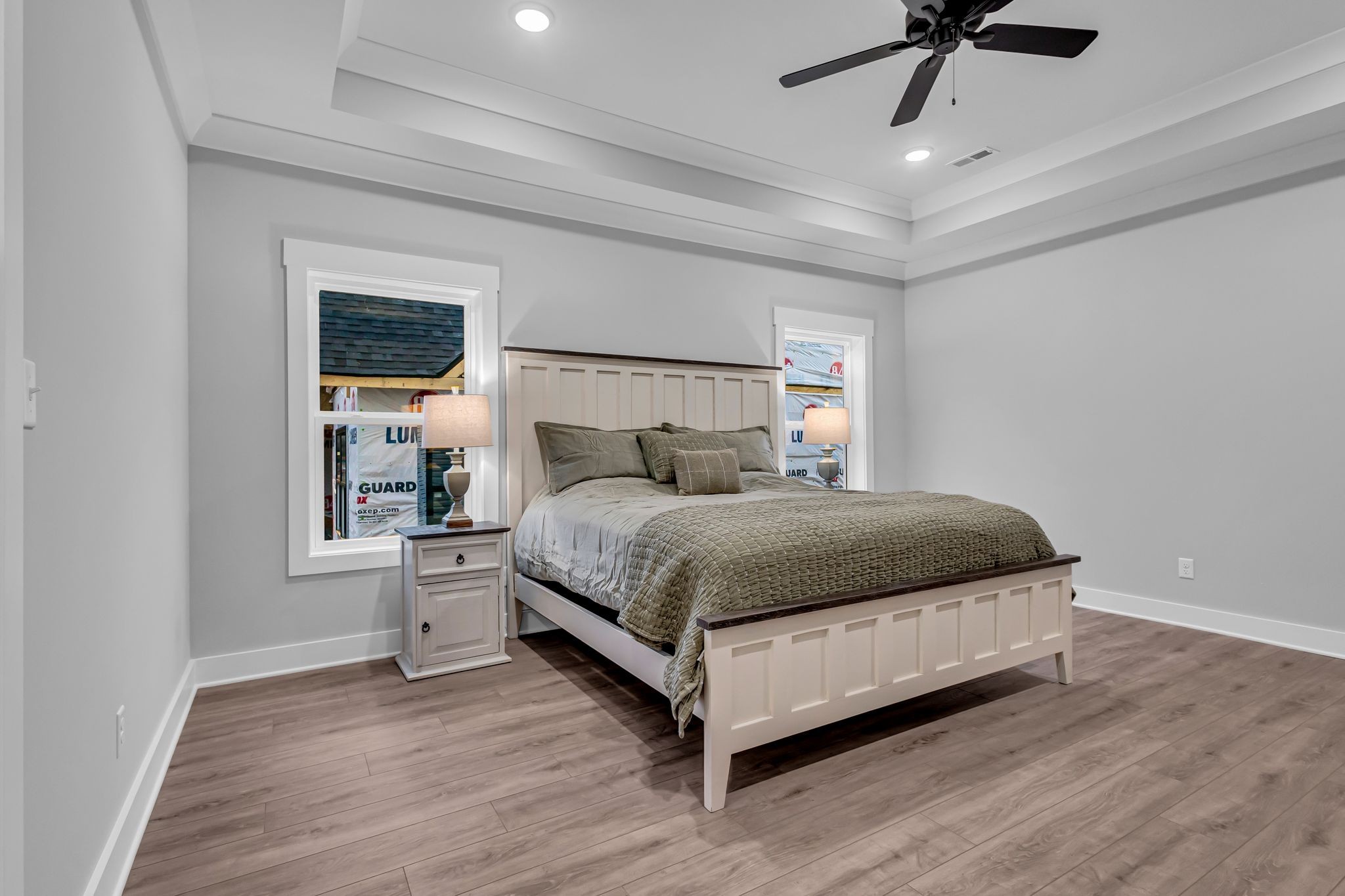 2504 Gentle Rain Road Knoxville, TN 37920 - Photo 29 of 45 a bedroom with a bed lamp and a window