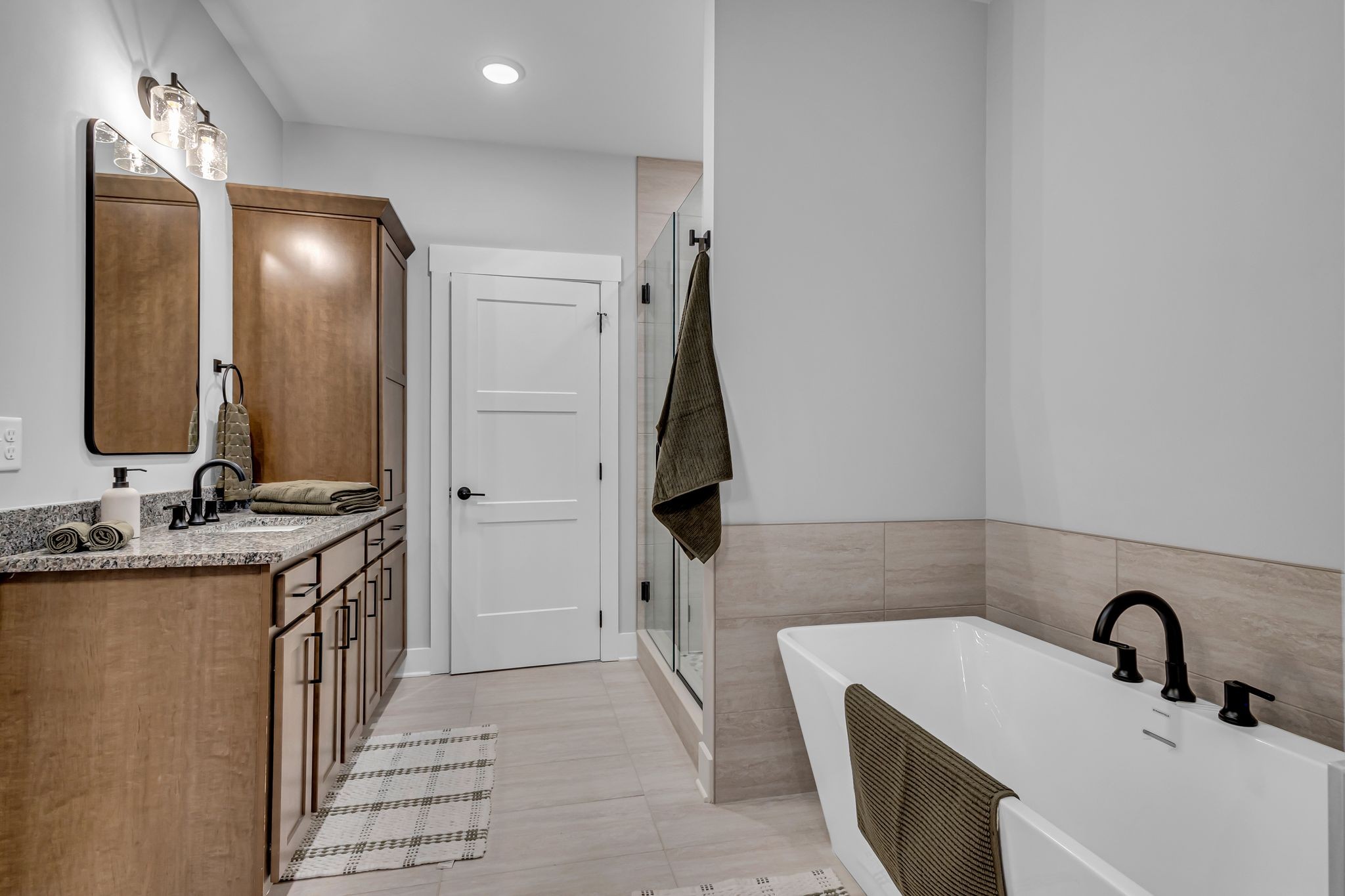 2504 Gentle Rain Road Knoxville, TN 37920 - Photo 36 of 45 a bathroom with a double vanity sink and a mirror