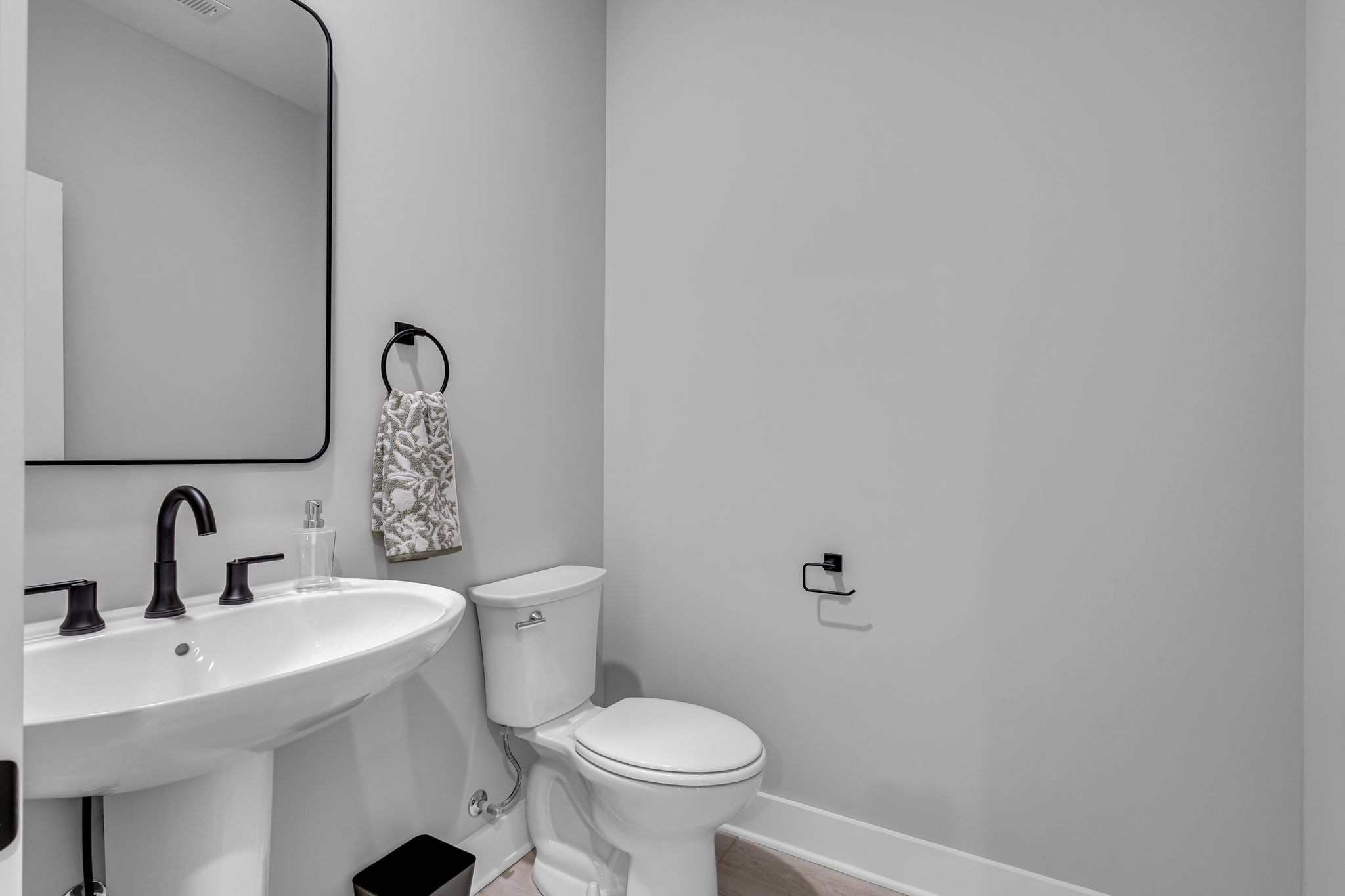 2504 Gentle Rain Road Knoxville, TN 37920 - Photo 38 of 45 a bathroom with a toilet sink and mirror