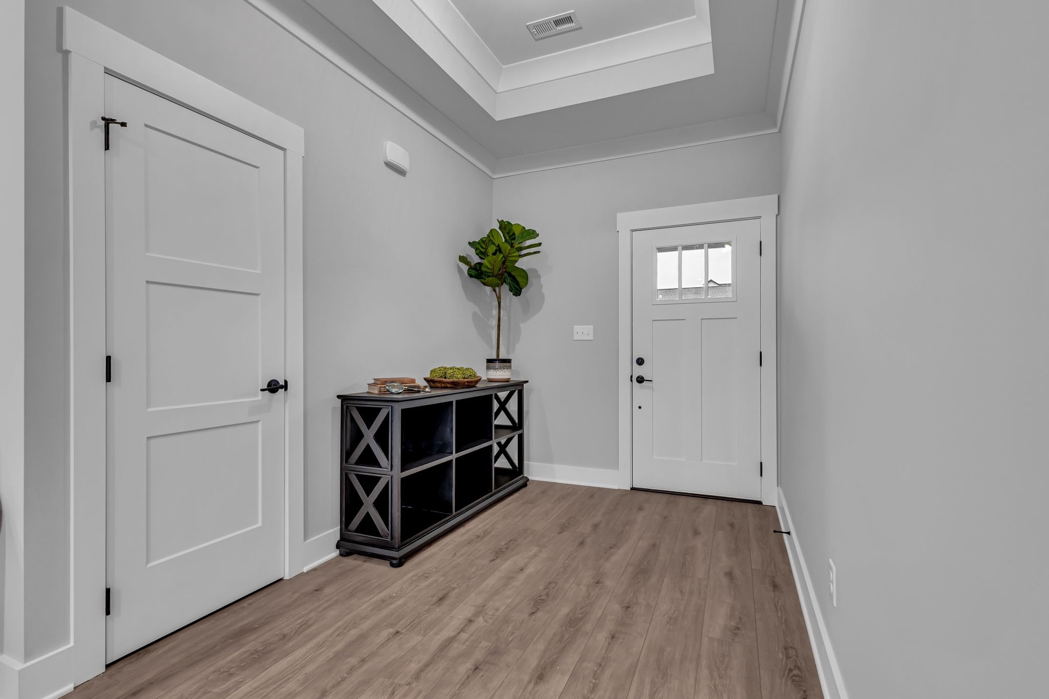 2504 Gentle Rain Road Knoxville, TN 37920 - Photo 5 of 45 a view of an empty room with wooden floor and a window