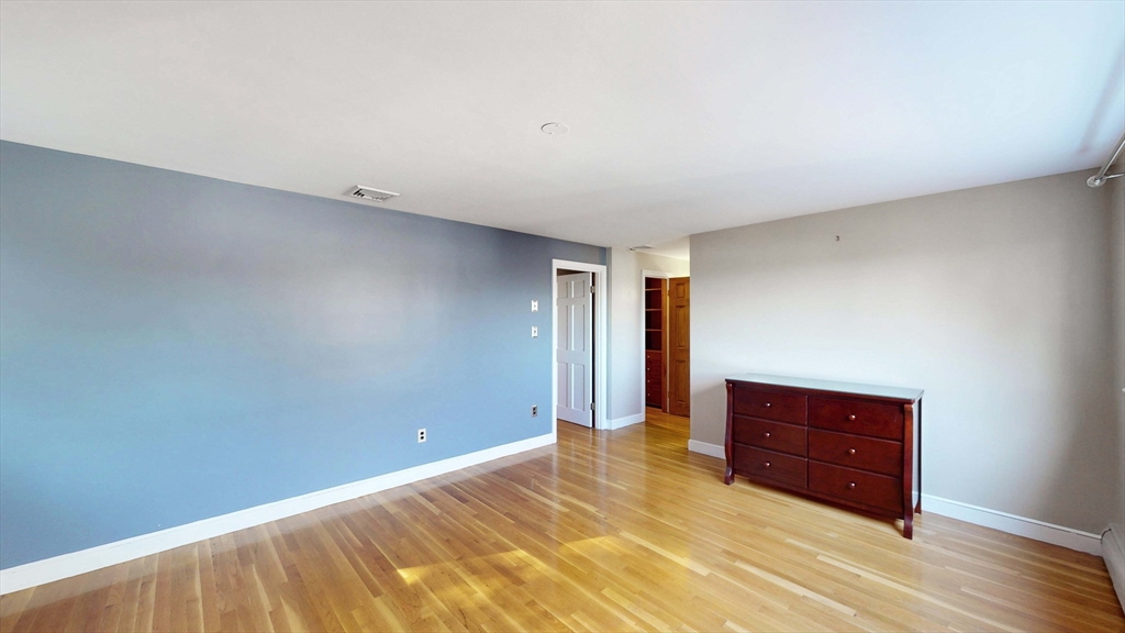13 West Street Woburn, MA 01801 - Photo 8 of 30 a view of room with wooden floor
