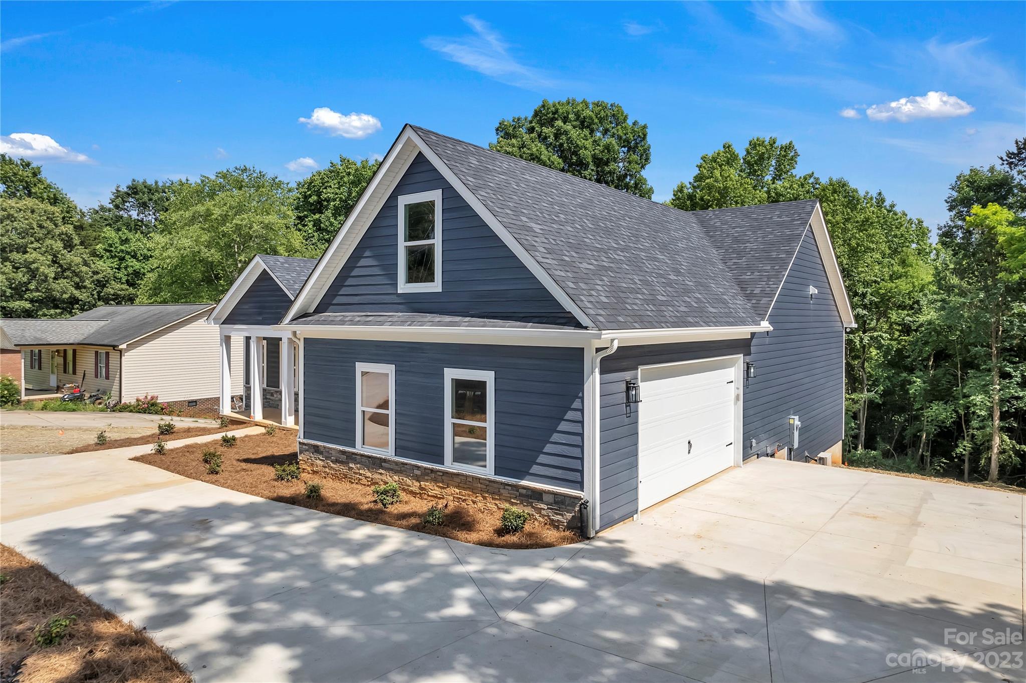 7550 Webbs Road Denver, NC 28037 - Photo 3 of 46 a view of a house with a yard