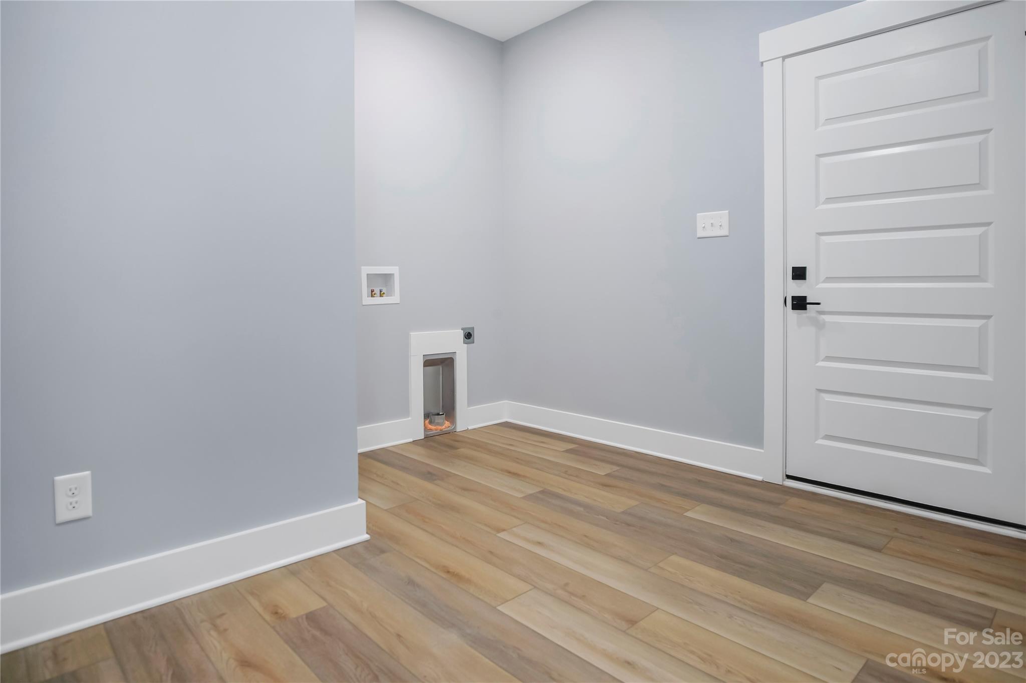 7550 Webbs Road Denver, NC 28037 - Photo 31 of 46 a view of empty room with wooden floor