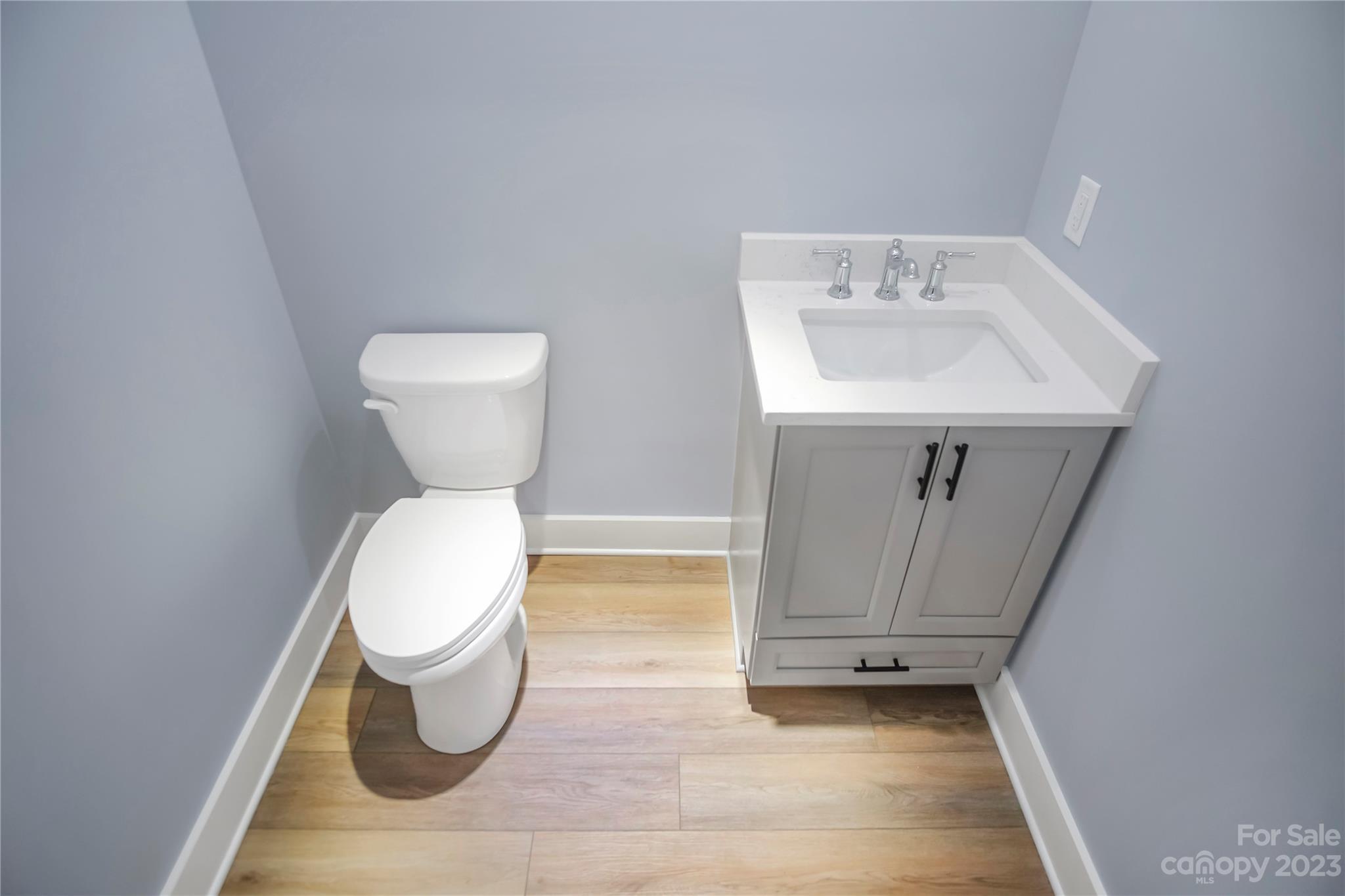 7550 Webbs Road Denver, NC 28037 - Photo 33 of 46 a bathroom with a sink and a toilet
