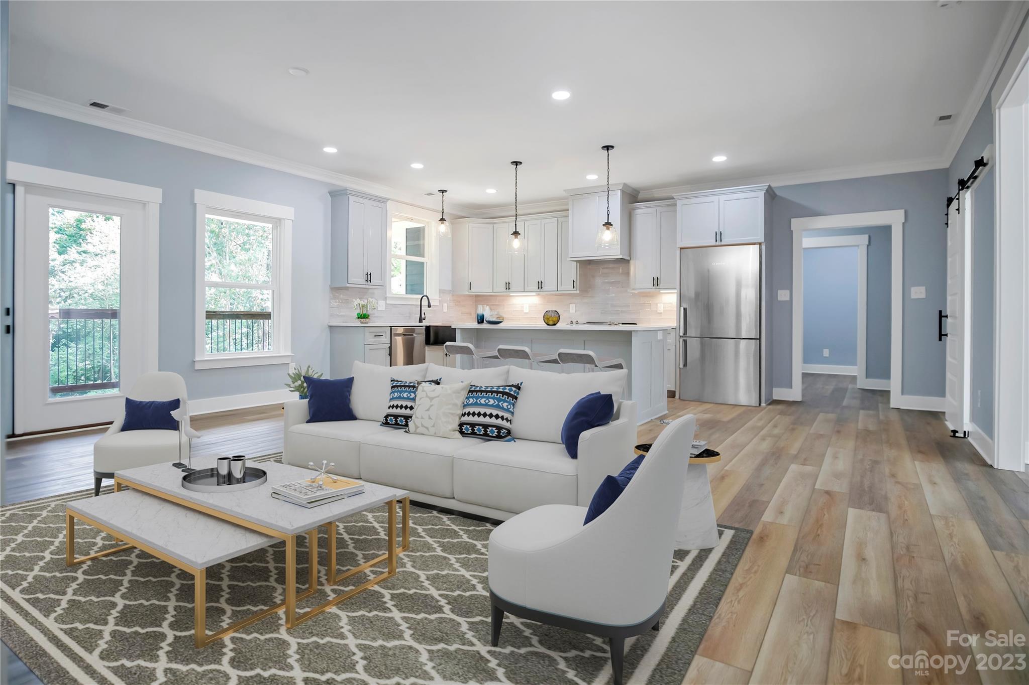 7550 Webbs Road Denver, NC 28037 - Photo 10 of 46 a living room with furniture and a wooden floor