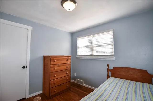 a bathroom with a toilet a sink and bathtub