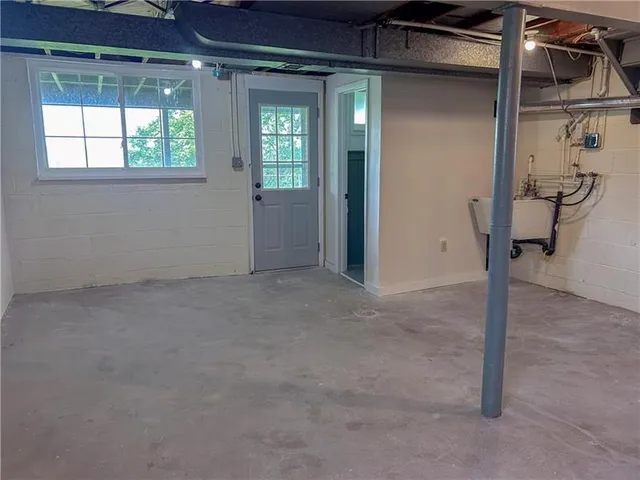 a balcony with wooden floor and fence