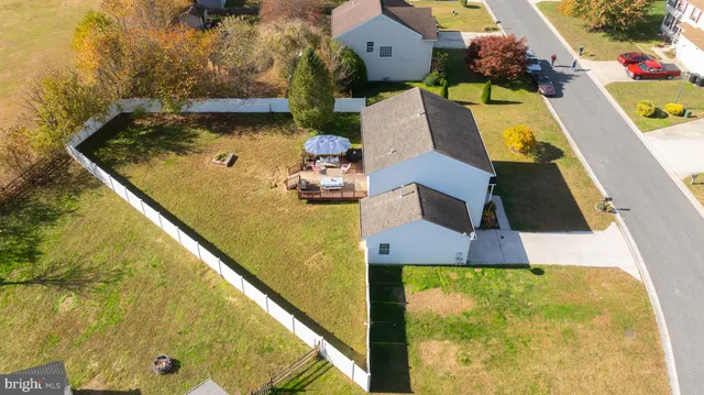 swimming pool with a garden view