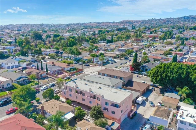 an aerial view of a city with lots of residential buildings