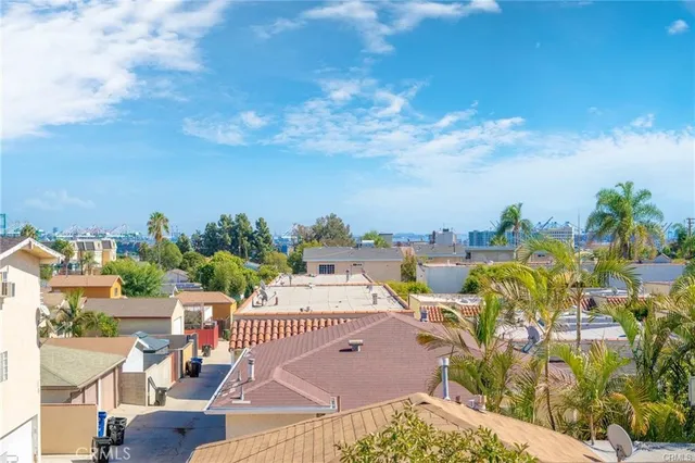 a view of a balcony with chairs