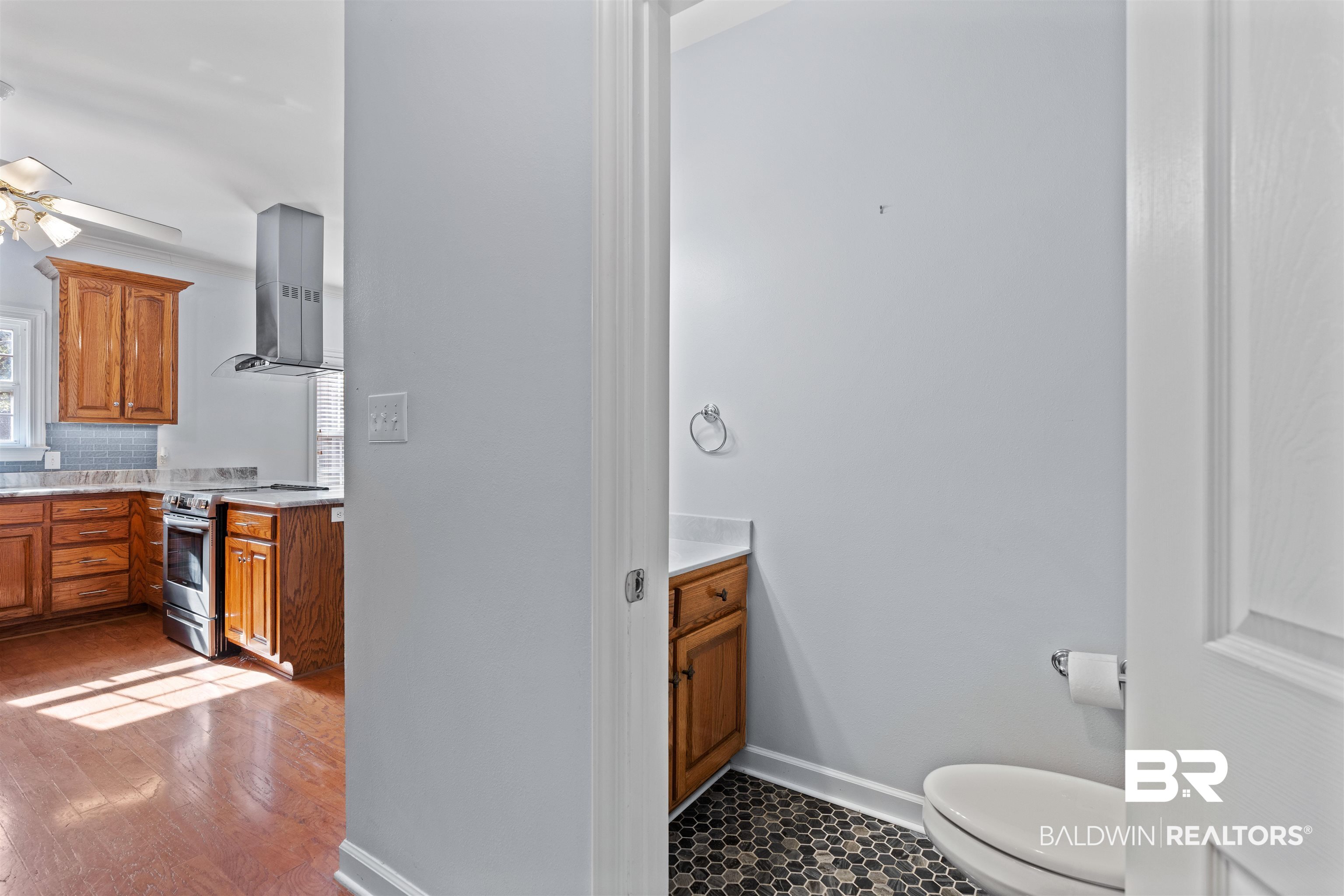 4 Judd Trail Daphne, AL 36527 - Photo 20 of 45 Bathroom with vanity, toilet, a ceiling fan, and baseboards