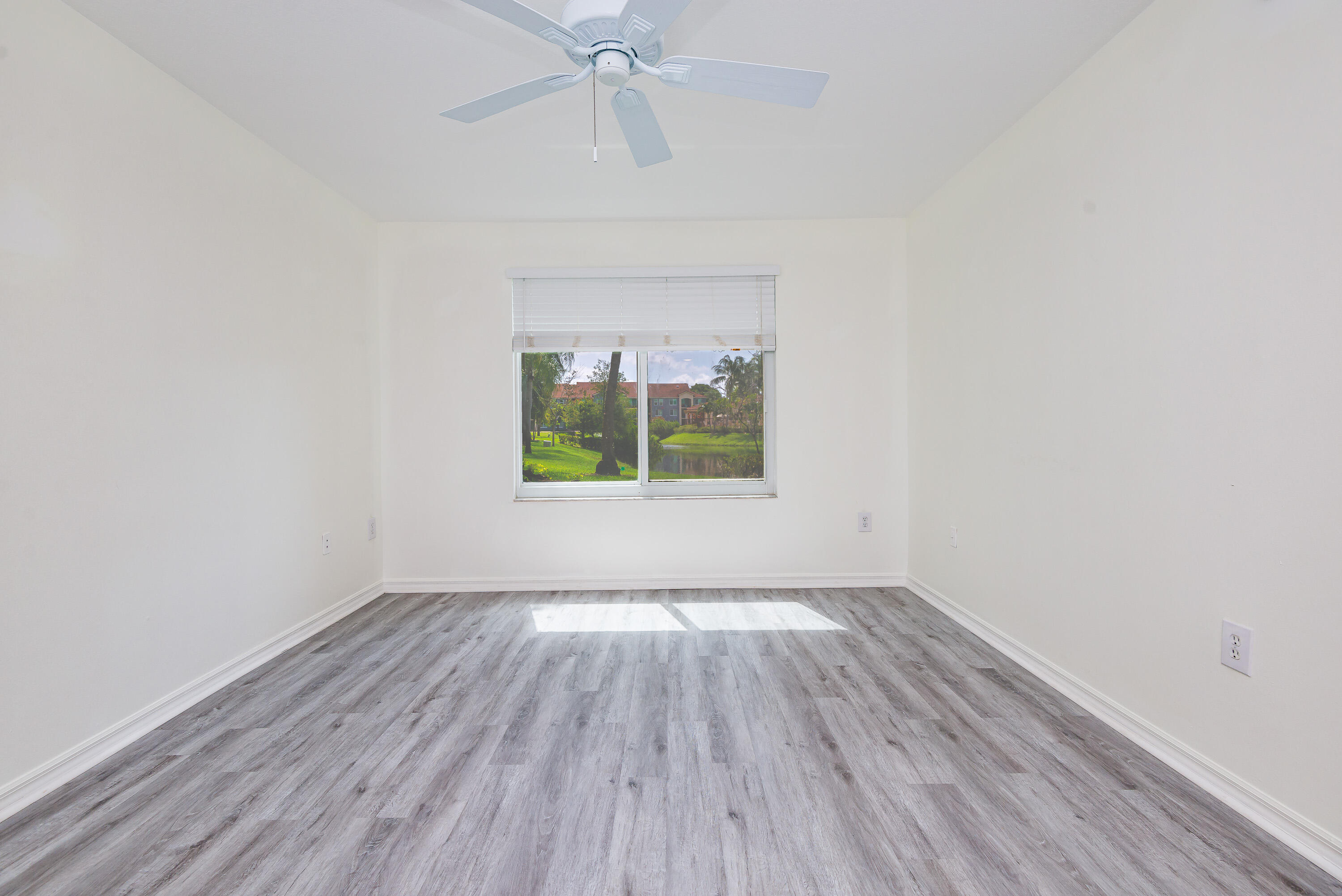 602 Villa Circle Boynton Beach, FL 33435 - Photo 12 of 27 an empty room that has a window