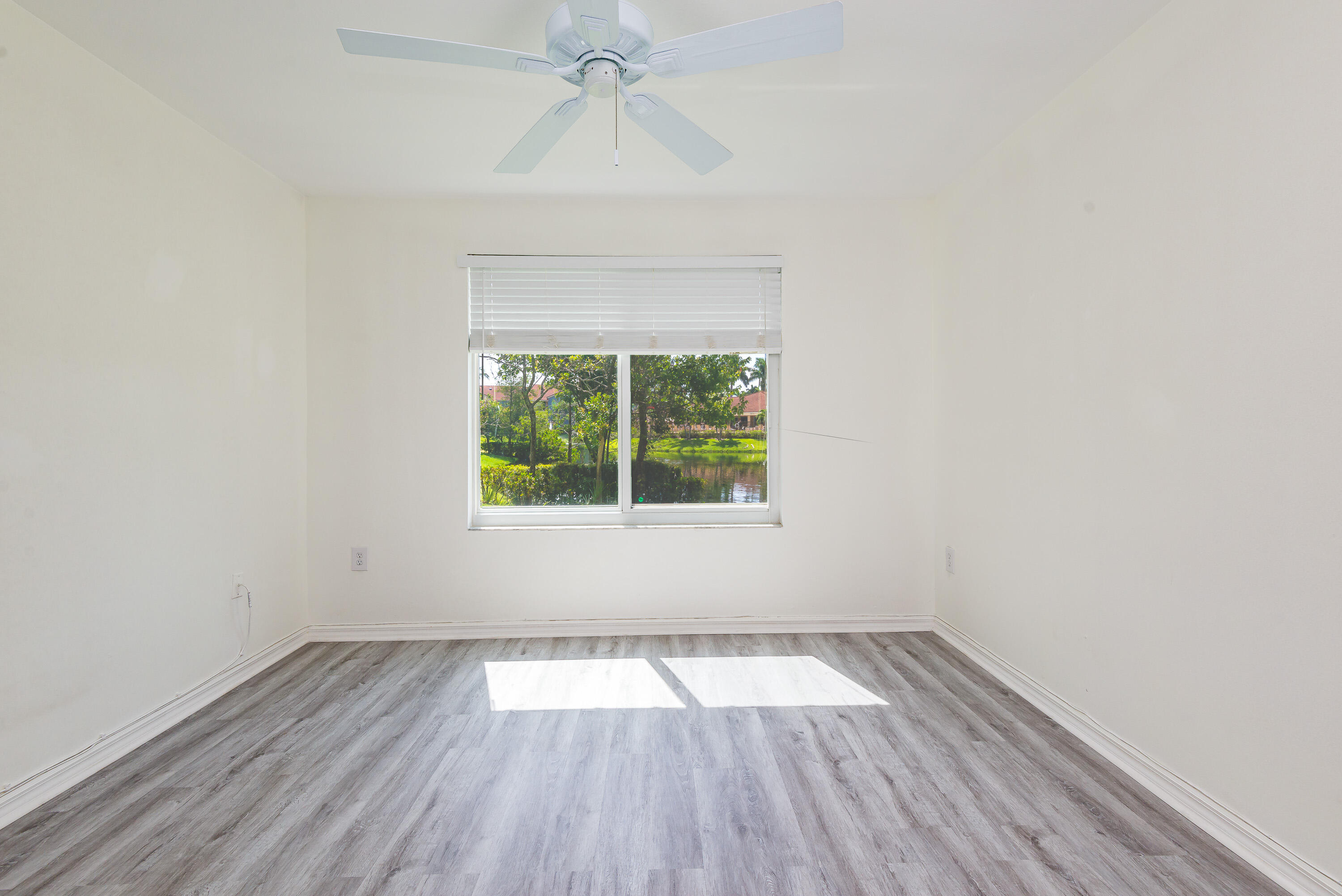 602 Villa Circle Boynton Beach, FL 33435 - Photo 16 of 27 an empty room with a window