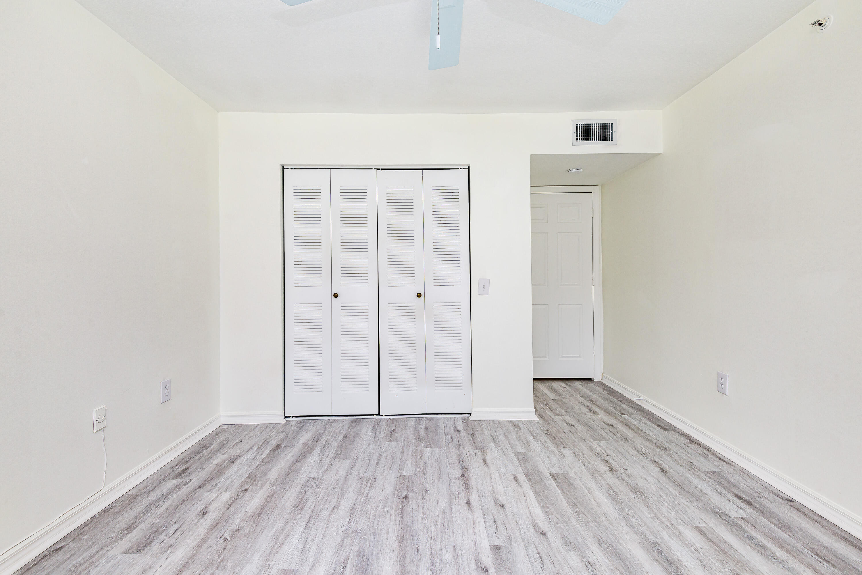 602 Villa Circle Boynton Beach, FL 33435 - Photo 17 of 27 wooden floor in an empty room
