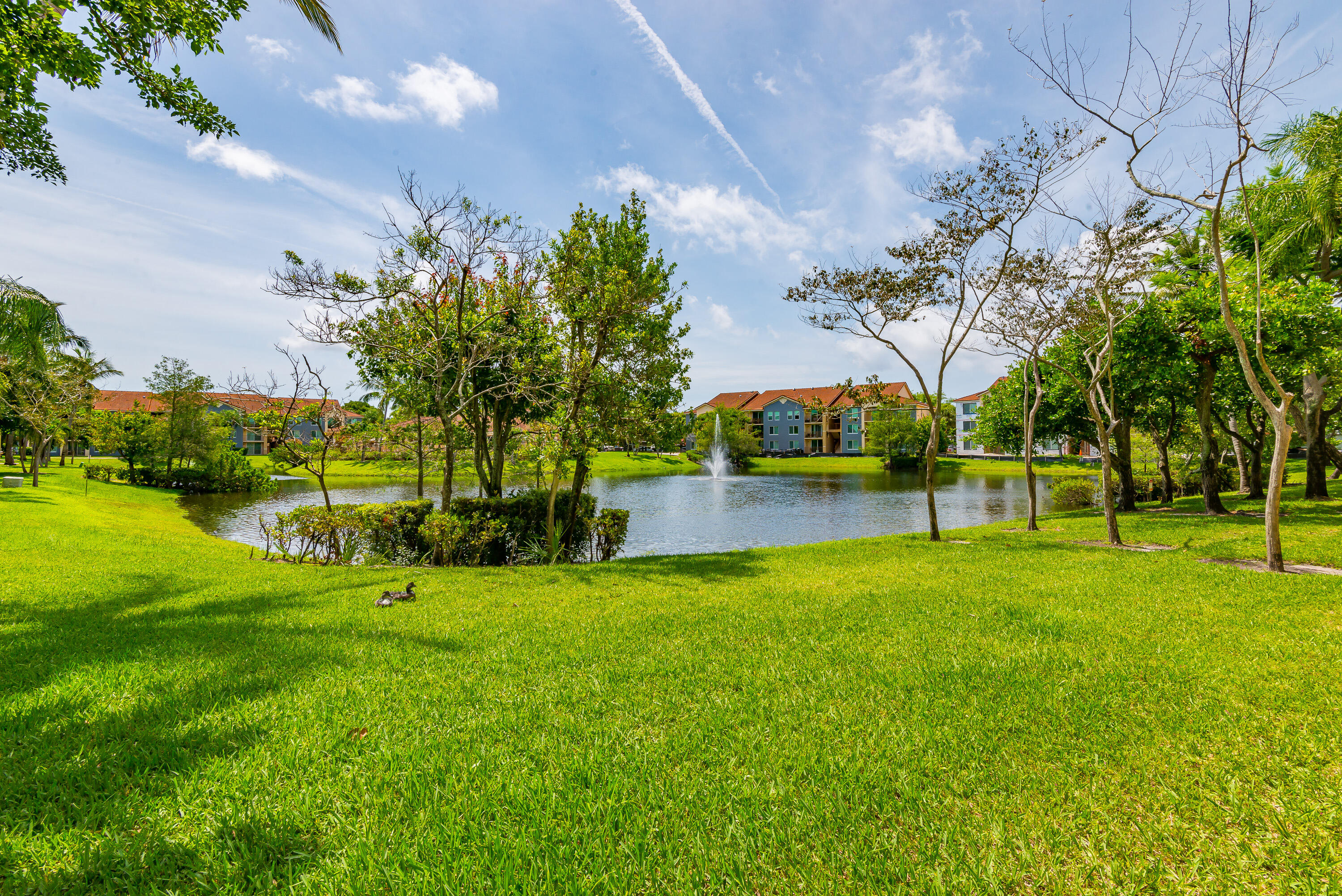 602 Villa Circle Boynton Beach, FL 33435 - Photo 2 of 27 a view of a golf course with a big yard