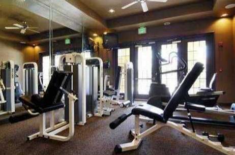 602 Villa Circle Boynton Beach, FL 33435 - Photo 27 of 27 a view of a room with gym equipment