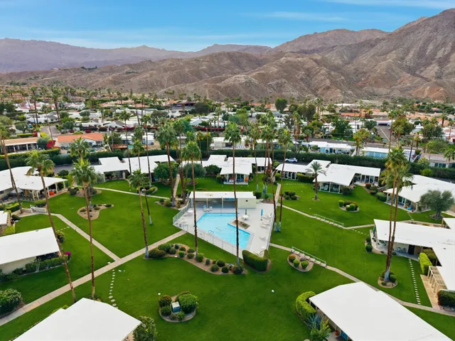 a view of a house with a garden