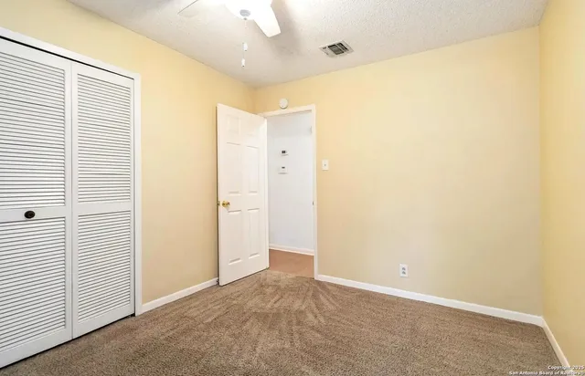 an empty room with a natural light