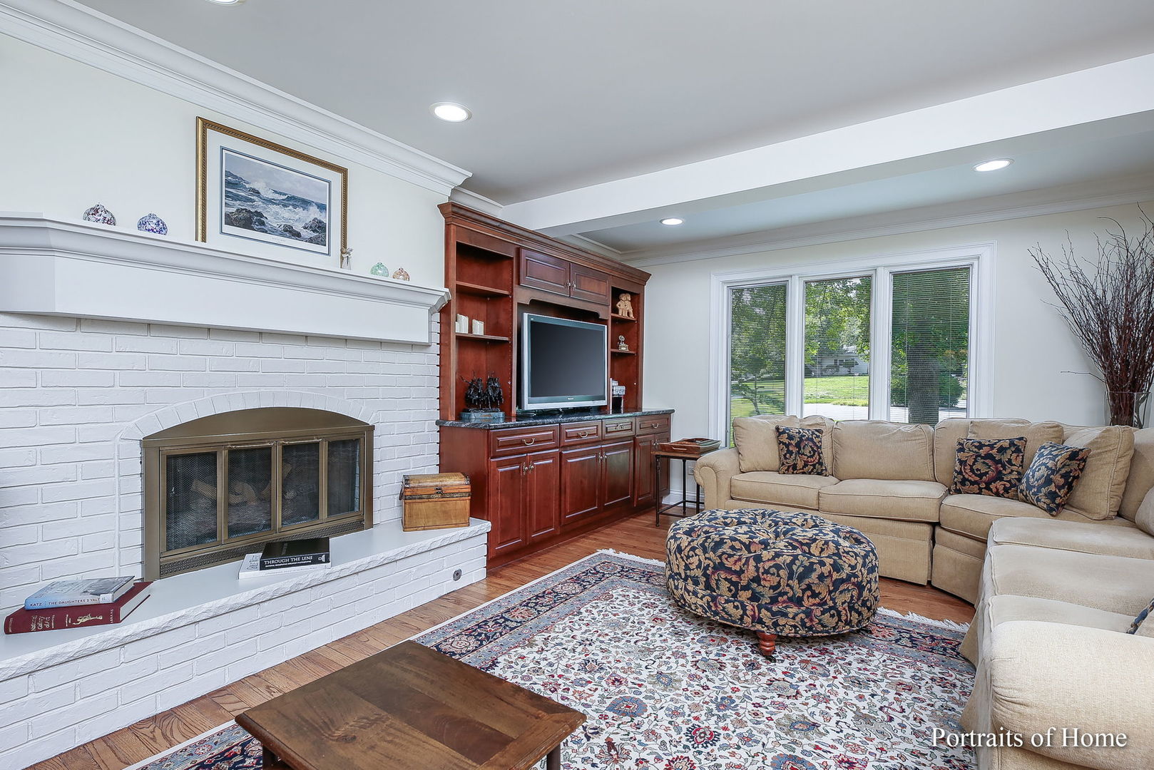 45 Cambridge Drive Oak Brook, IL 60523 - Photo 13 of 41 a living room with furniture and a fireplace