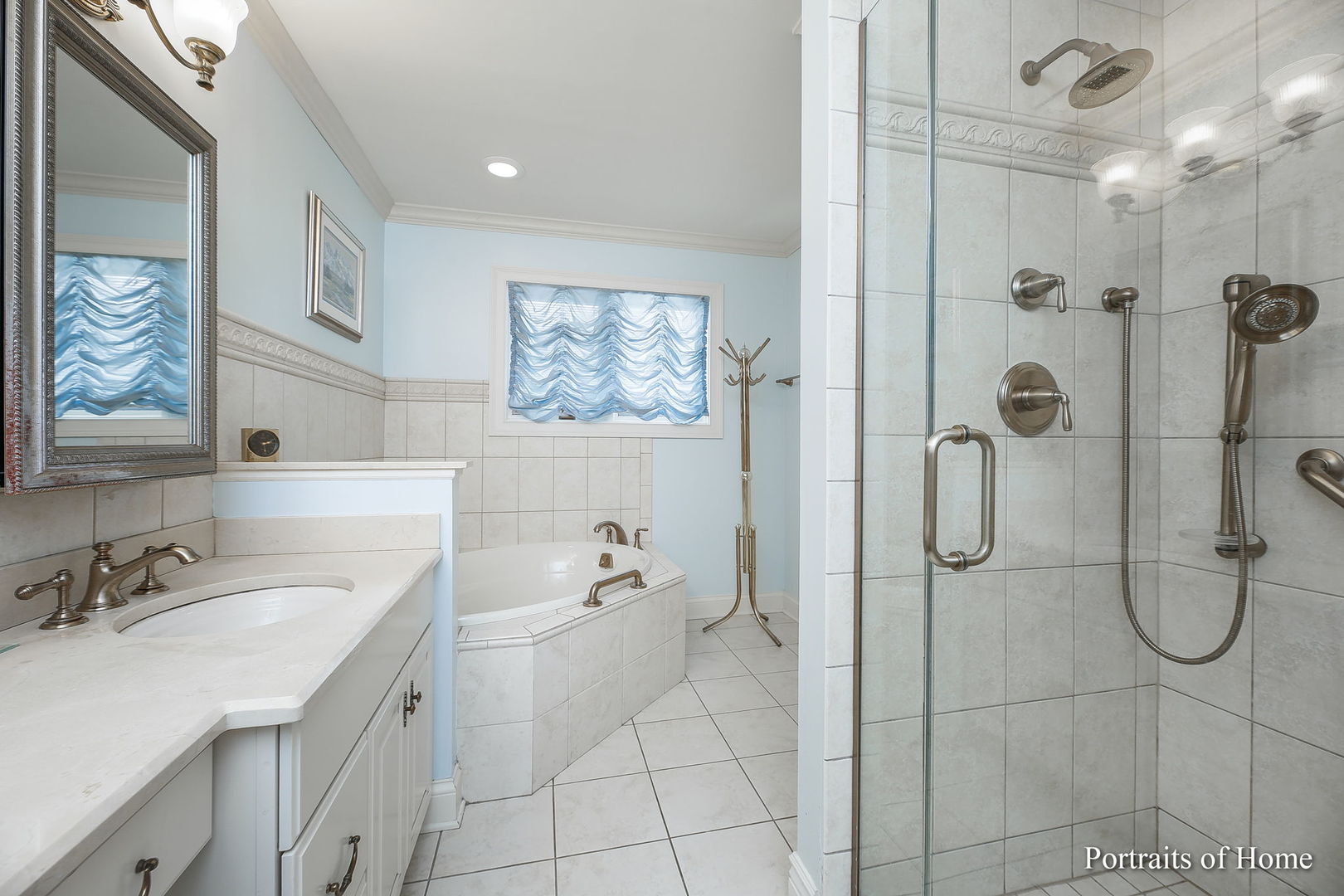 45 Cambridge Drive Oak Brook, IL 60523 - Photo 21 of 41 a bathroom with a granite countertop shower sink and mirror