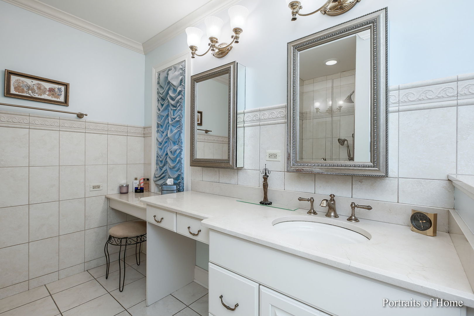 45 Cambridge Drive Oak Brook, IL 60523 - Photo 22 of 41 a bathroom with a sink and a mirror