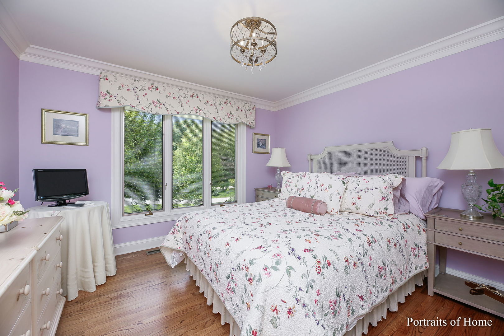 45 Cambridge Drive Oak Brook, IL 60523 - Photo 23 of 41 a bedroom with a bed and glass window