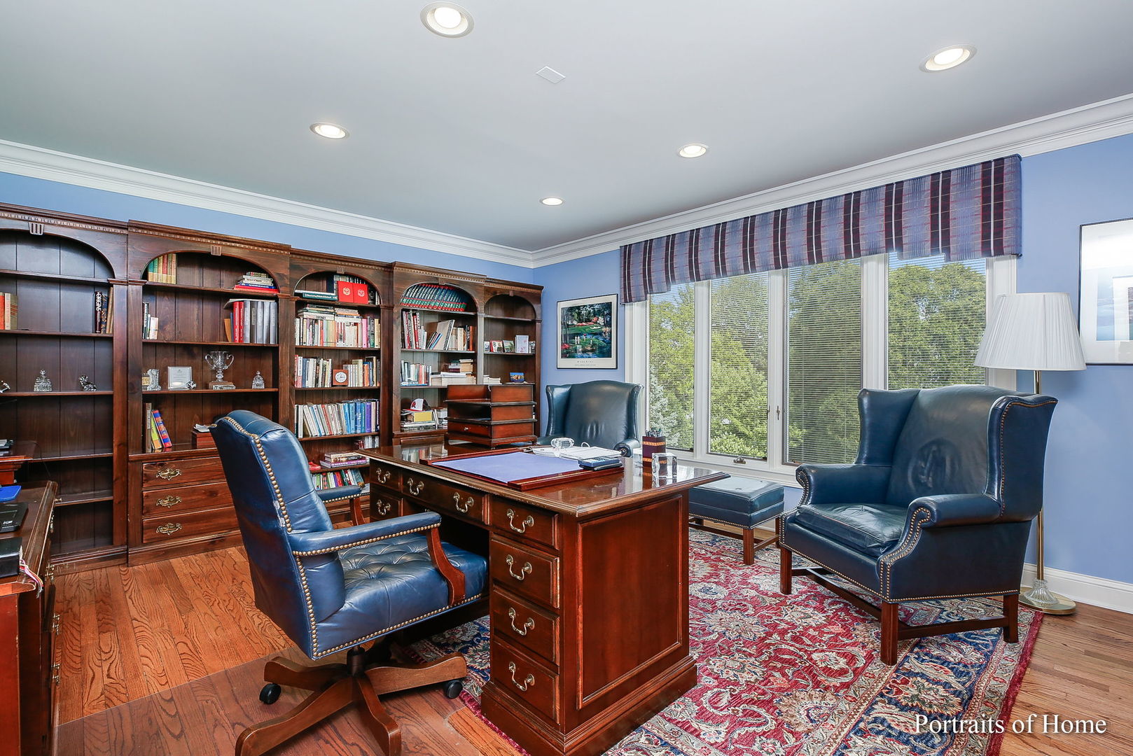 45 Cambridge Drive Oak Brook, IL 60523 - Photo 25 of 41 a work room with furniture and a book shelf