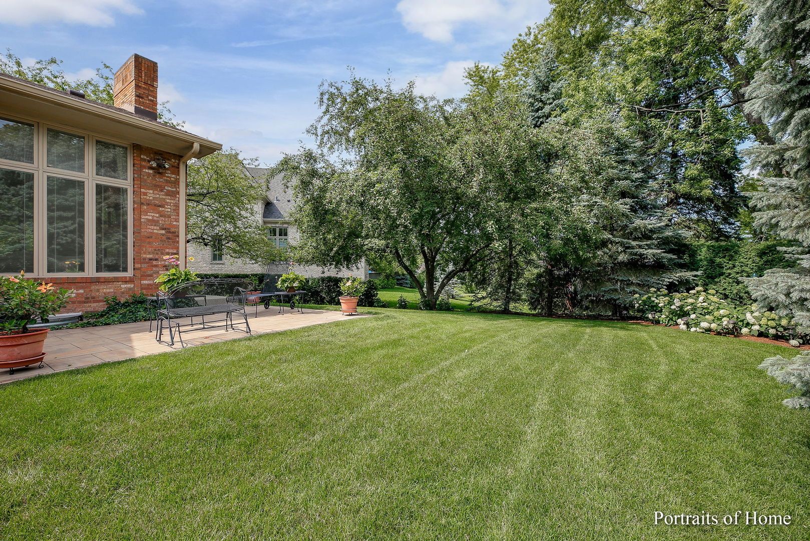 45 Cambridge Drive Oak Brook, IL 60523 - Photo 34 of 41 a house view with a garden space