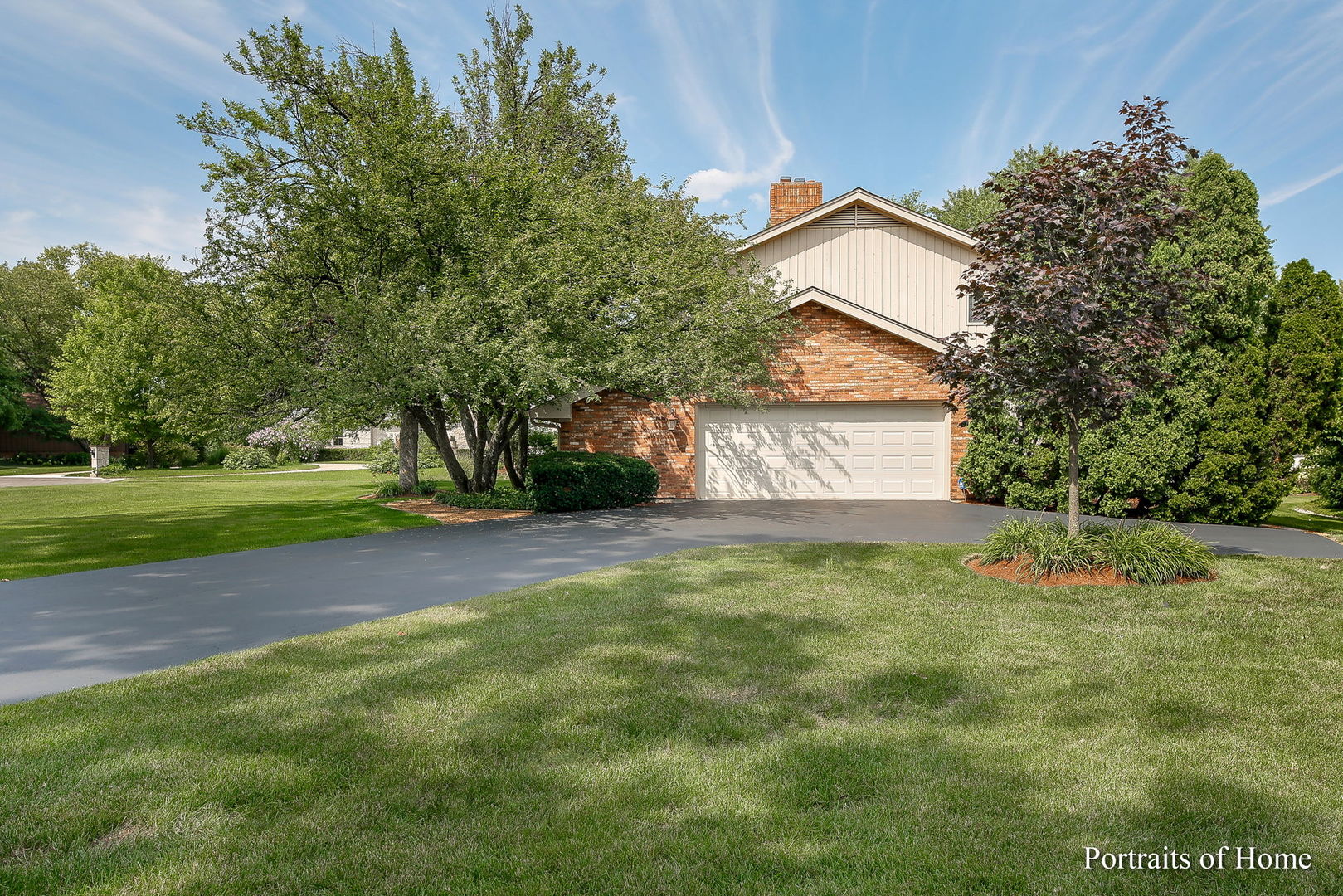 45 Cambridge Drive Oak Brook, IL 60523 - Photo 37 of 41 a view of backyard of house with trees