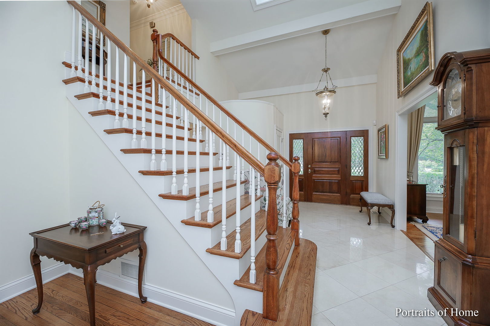 45 Cambridge Drive Oak Brook, IL 60523 - Photo 4 of 41 a view of entryway and hall with wooden floor