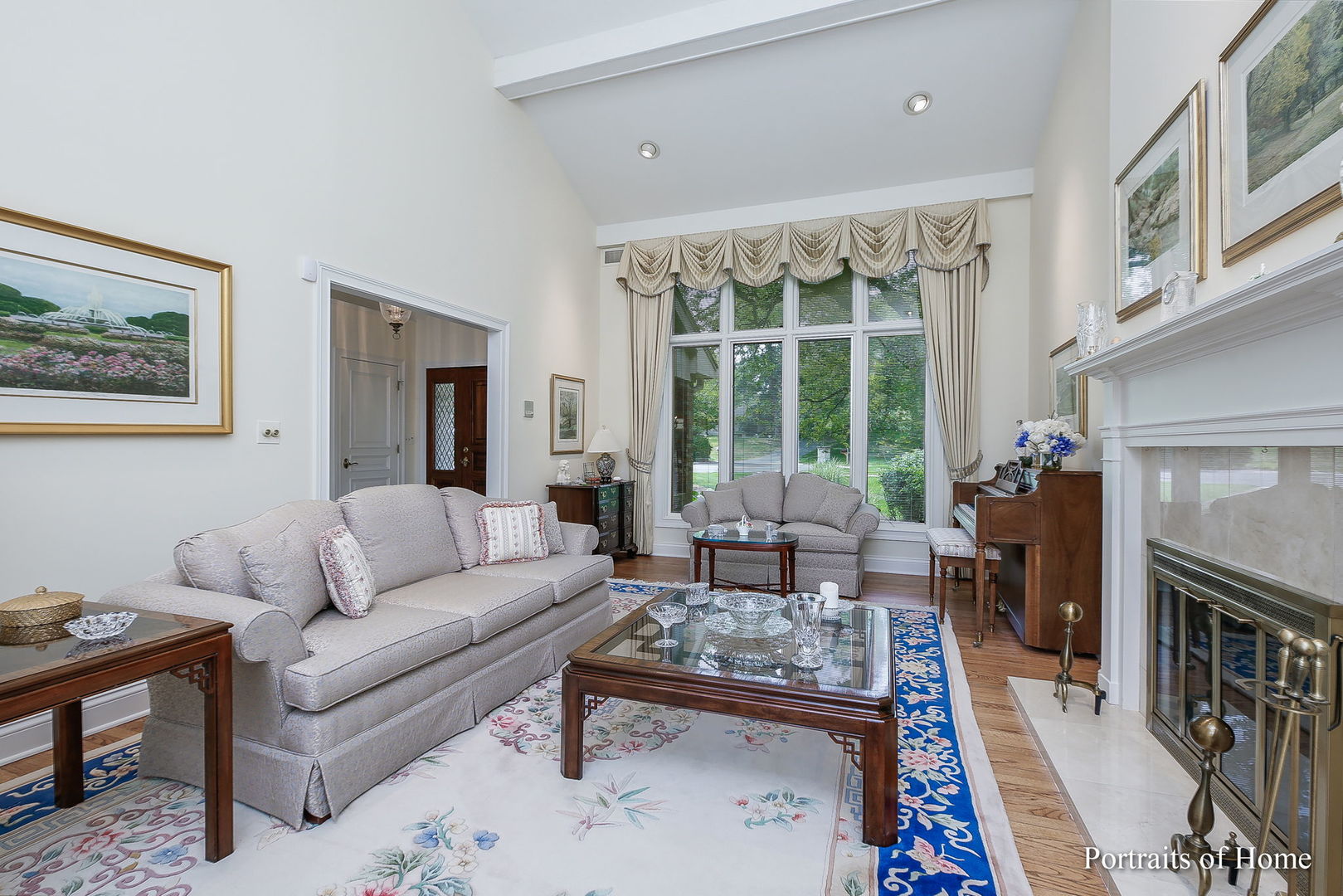 45 Cambridge Drive Oak Brook, IL 60523 - Photo 6 of 41 a living room with furniture and a fireplace