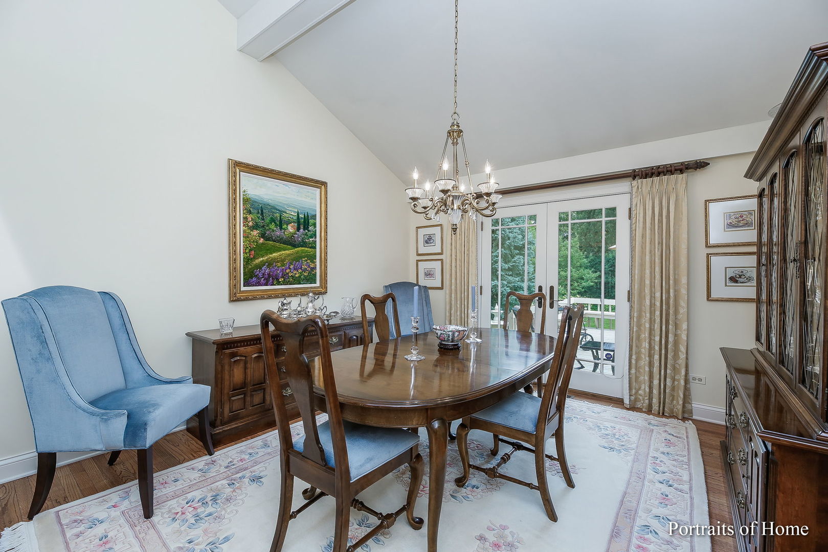 45 Cambridge Drive Oak Brook, IL 60523 - Photo 7 of 41 a view of a dining room with furniture a chandelier and wooden floor