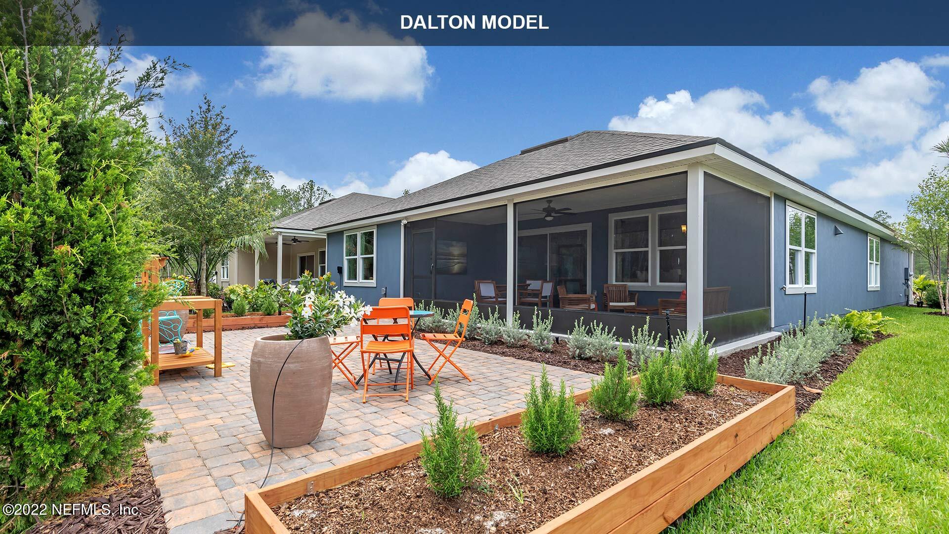 1360 Parkland Trail St. Augustine, FL 32095 - Photo 17 of 37 a house view with a seating space and garden